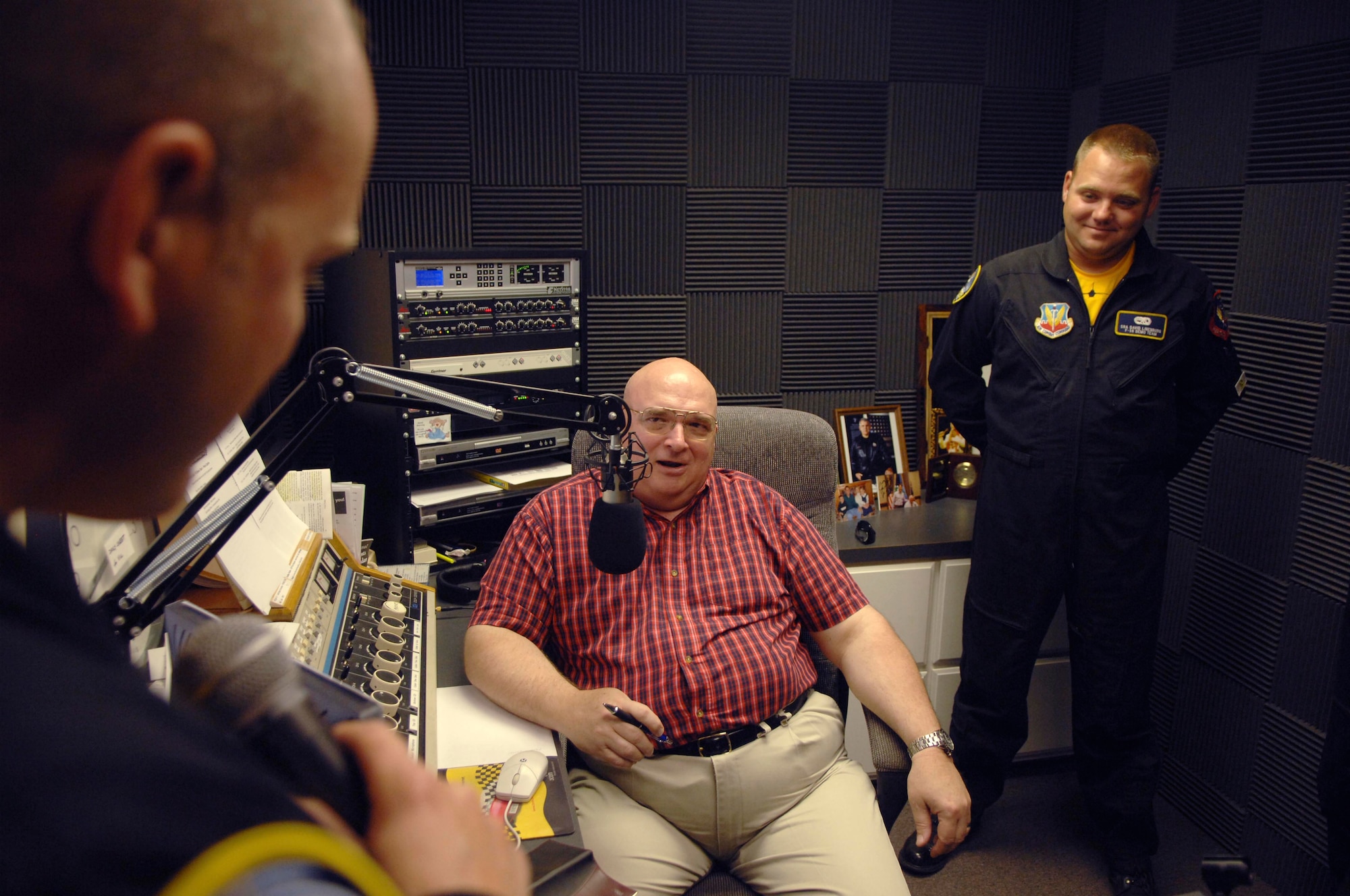 FLORENCE, S.C.-- Master Sgt. Bryan Spangler and Senior Airman David Linenburg, both F-16 Viper East Demonstration Team members, discuss why they joined the Air Force with Tom Kindard, radio host for Kinard 'N Koffee, on STAR 93.7 at Miller Communications May 22. The interview was broadcasted on a 6,000-watt signal covering a 40-mile radius with daytime coverage in Florence, Darlington, Hartsville, Timmonsville, Lake City and Bishopville. (U.S. Air Force photo/Staff Sgt. Nathan Bevier)