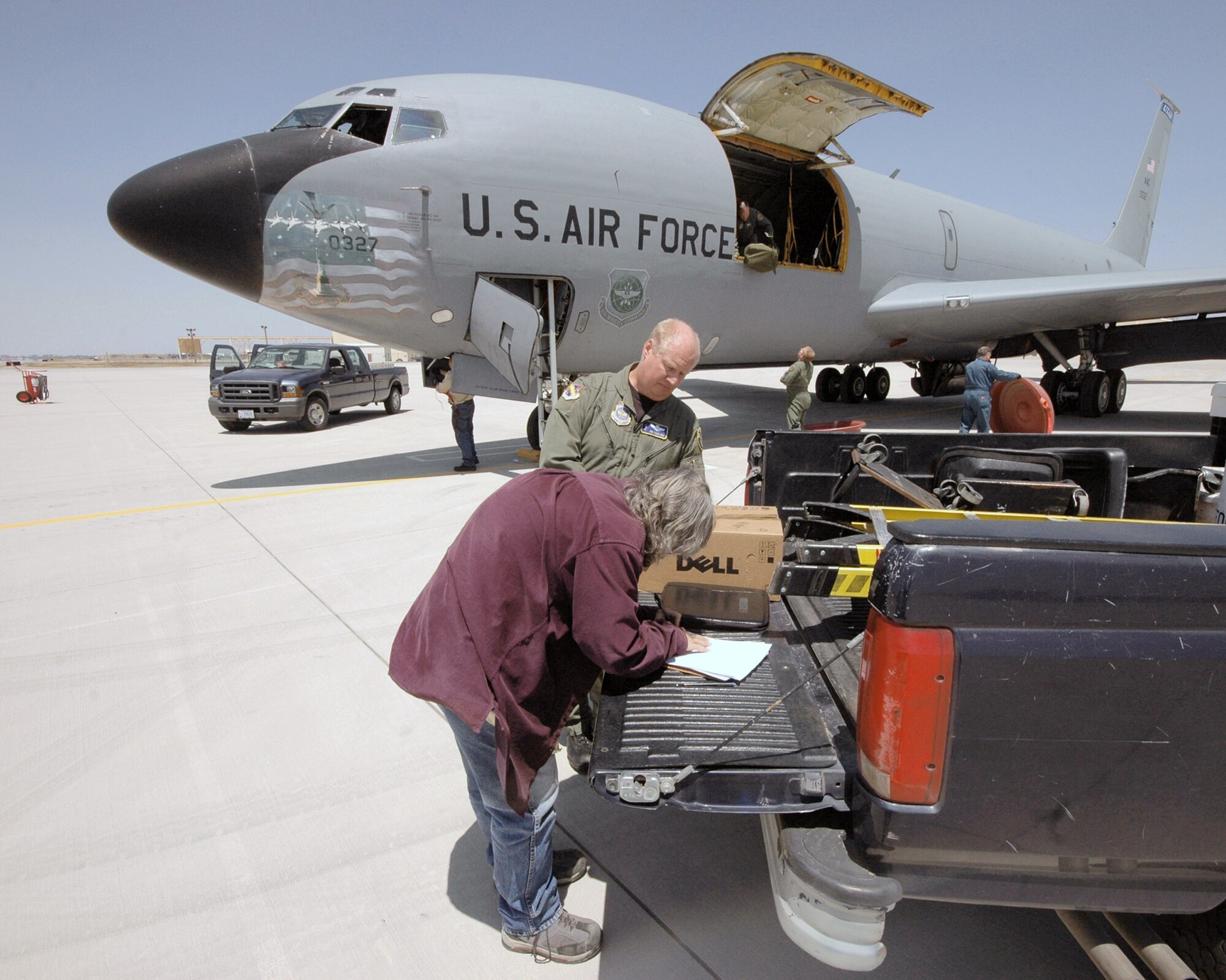 A KC-135 E model Stratotanker, tail number 0327, is received by 309th Aerospace Maintenance and Regeneration Group members April 24 at Davis-Monthan Air Force Base, Ariz. The 48-year-old aircraft was delivered for long term storage at the 2,600 acre facility after serving with the 151st Air Refueling Wing of the Utah Air National Guard for more than 20 years. (U.S. Air Force photo/Master Sgt. Burke Baker)