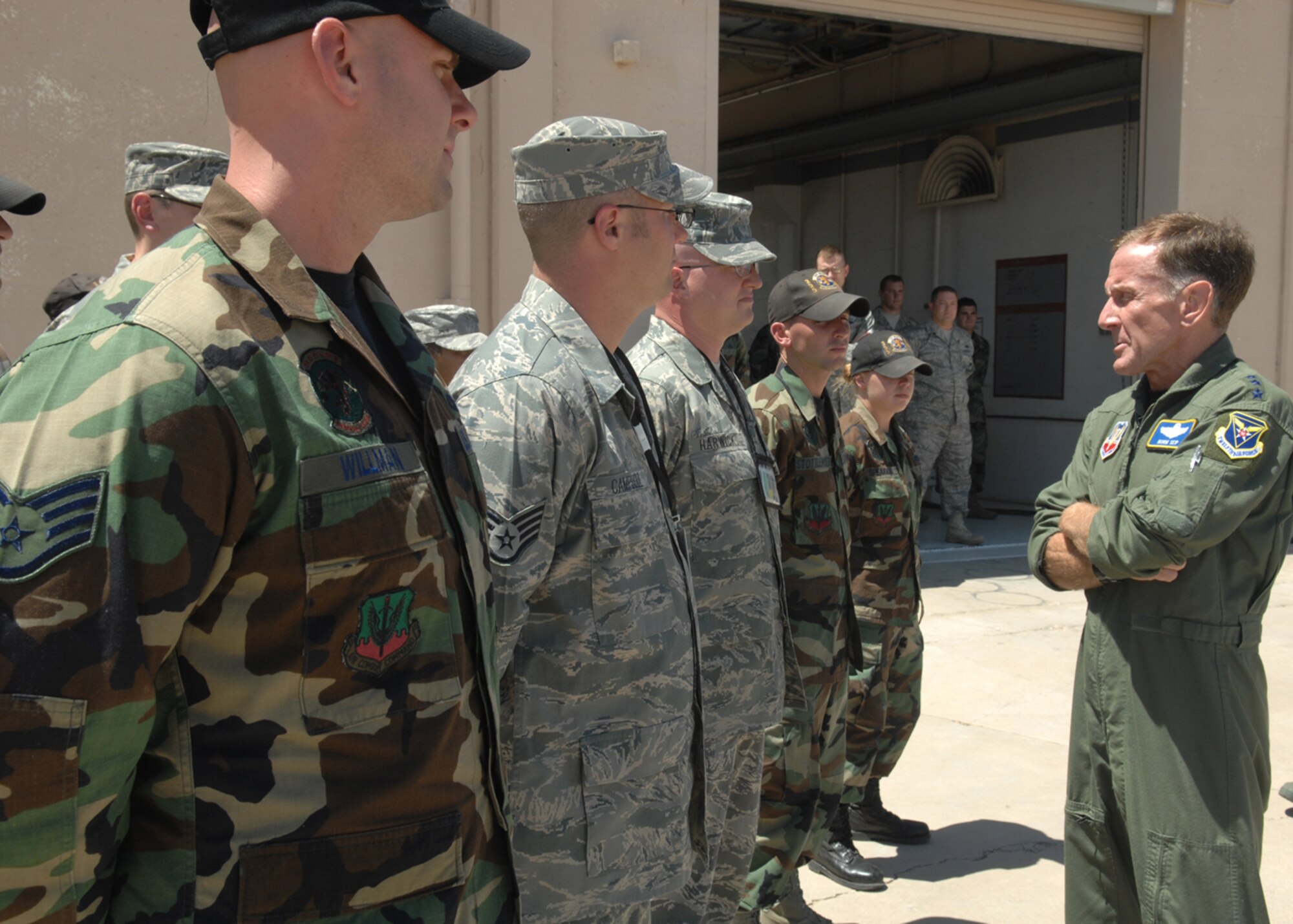 Lt. Gen. Norman Seip, 12th Air Force (Air Forces Southern) commander, talks to Airmen from the 355th Equipment Maintenance Squadron ammunition flight, during his visit to the 355th Fighter Wing May 19. General Seip was the first General Officer to see the stellar work the Airmen are doing out at ammunitions in a long time.  During his visit General Seip got to see things that are doing very well in the wing and meet Airmen doing a great job.  (U.S. Air Force photo by Senior Airman Jacqueline Hawkins)
