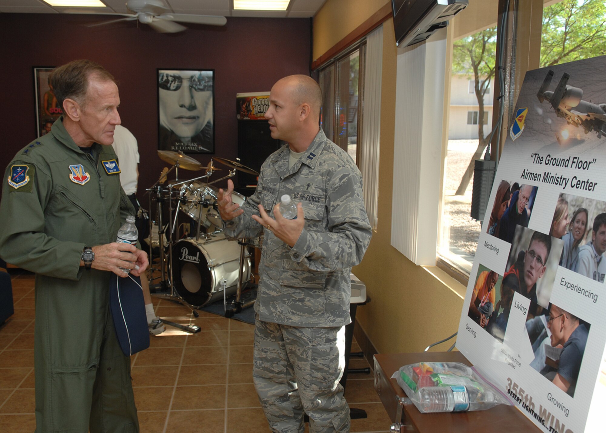 Chaplin (Capt.) David Merrifield, 355th Fighter Wing chaplain, talks to Lt. Gen.  Norman Seip, 12th Air Force (Air Forces Southern) commander, about “The Ground Floor” program at the dorms during his visit to the 355th Fighter Wing May 19.  General Seip visited different organizations to see the 355th Fighter Wing mission. (U.S. Air Force photo by Senior Airman Jacqueline Hawkins)
