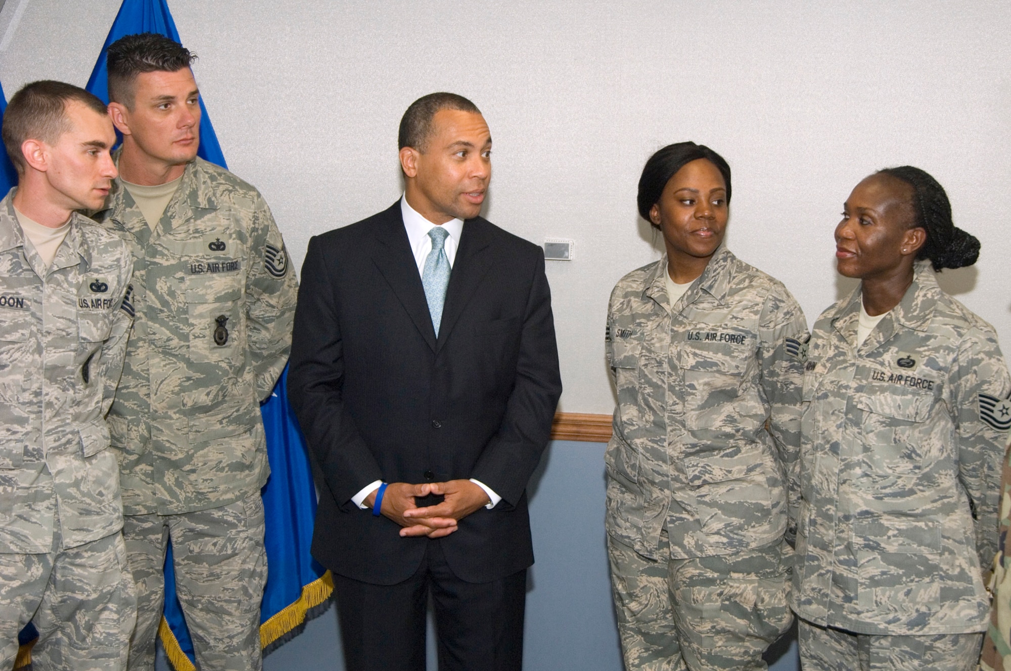 HANSCOM AFB, Mass. -  Following a meeting at Hanscom AFB, Governor Deval Patrick chats with some of Hanscom’s recent deployers.  They are: Tech Sgt. Michael Muldoon and Tech Sgt. Shon Teicheira of the 66th Security Forces, and Senior Airman Tawnya Smith and Tech Sgt. Jillian John of the 66th Mission Support Squadron. (U.S. Air Force Photo by Mark Wyatt)

