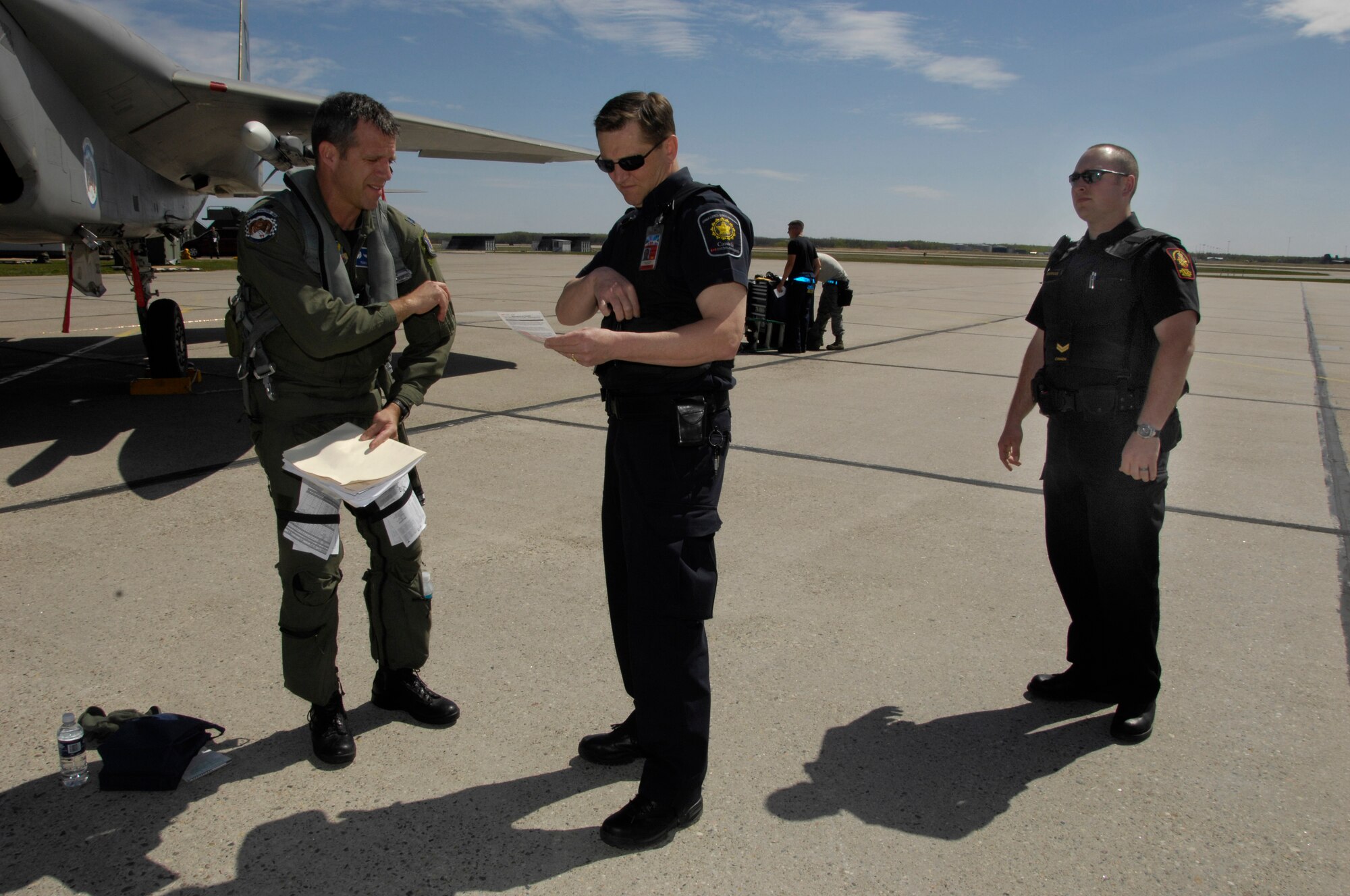 Lt. Col. Todd Jaax, 58th Fighter Squadron commander, completes the customs declaration upon landing his F-15C Eagle at 4 Wing Cold Lake, Alberta for Maple Flag 41 Period Two May 17.  Maple Flag is a four week international air combat exercise held annually at 4 Wing Cold Lake, Alberta.  The exercise provides Canadian and allied aircrew with realistic training in a modern simulated air combat environment, and emphasizes air operations involving large package coalition forces.  

(U.S. Air Force photo by Staff Sgt. Kenny Kennemer/released)
