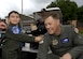 Brandon Leach, the "Pilot for a Day" rips the squadron patch of Col (U.S. Air Force photo by Senior Airman Renae Kleckner)(released)