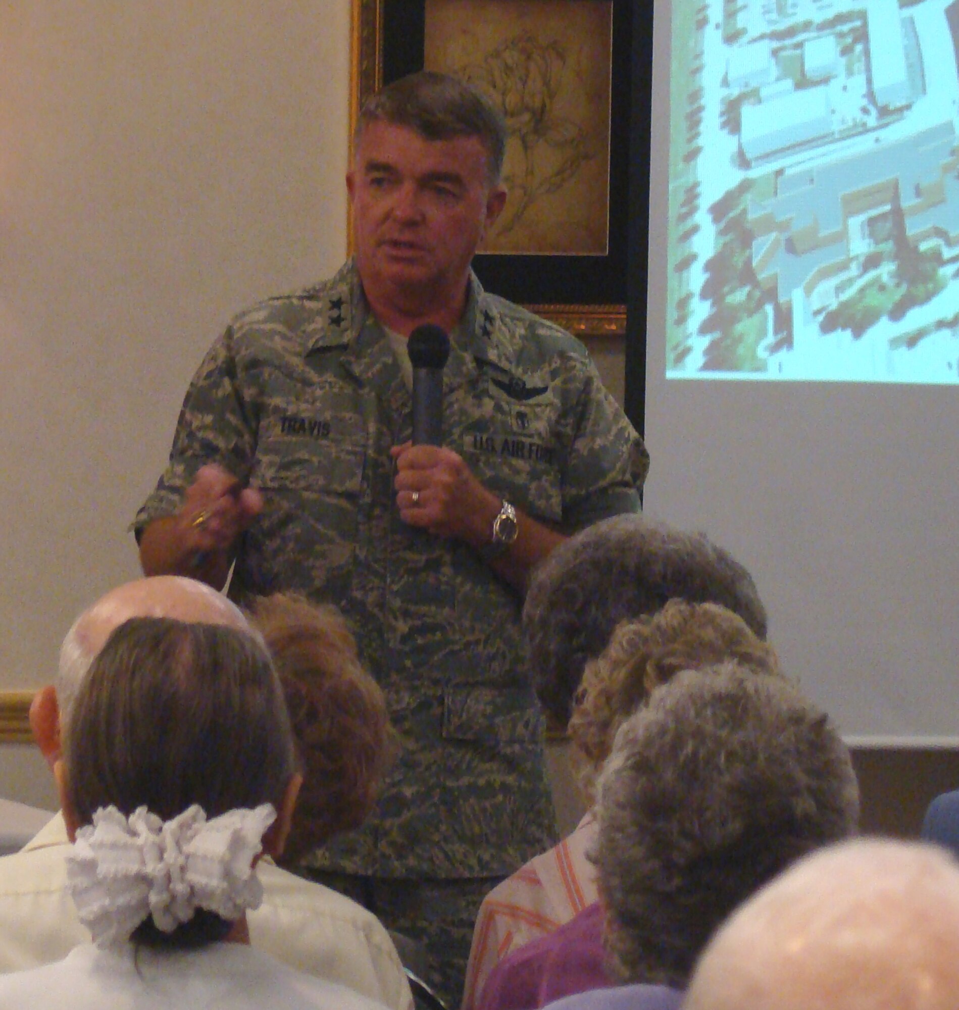 59th Medical Wing Commander Maj. Gen. Tom Travis gives a briefing about Base Realignment and Closure initiatives in San Antonio to Air Force Village residents on May 20. (U.S. Air Force Photo)