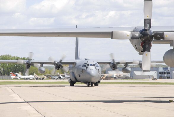 MINNAPOLIS-ST. PAUL AIR RESERVE STATION, MINN -- A C-130 (H3 model) from the 914th Airlift Wing at Niagara Falls Air Reserve Station, N.Y. taxis in behind one of the 934th Airlift Wing?s H2 models here May 20. The plane?s arrival is part of the Base Realignment and Closure plan to switch the 934th AW?s H2 models of the C-130 Hercules for the New York unit?s H3 models in an effort to streamline both units? operations with their Air National Guard counterparts. Air Force Photo/Master Sgt. Paul Zadach

