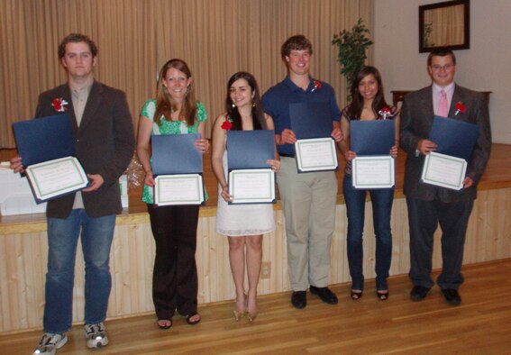 Winners of educational scholarships sponsored by the Malmstrom Spouse's Club pose with ther certificates presented at an awards dinner May 15. (Courtesy photo)