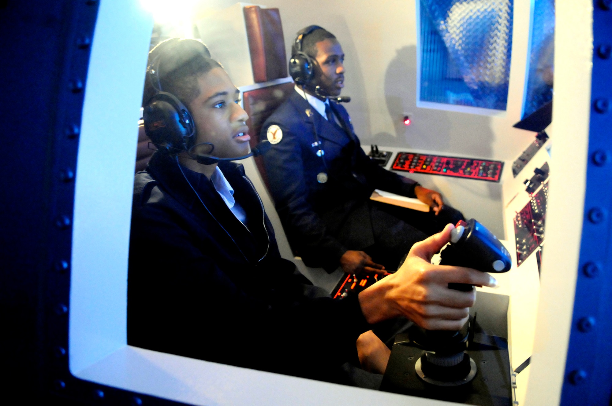 Cadets Dwight Brown and LeShawn Boyd manuever a simulated flight from Nellis AFB to Catalina. U. S. Air Force photo by Sue Sapp