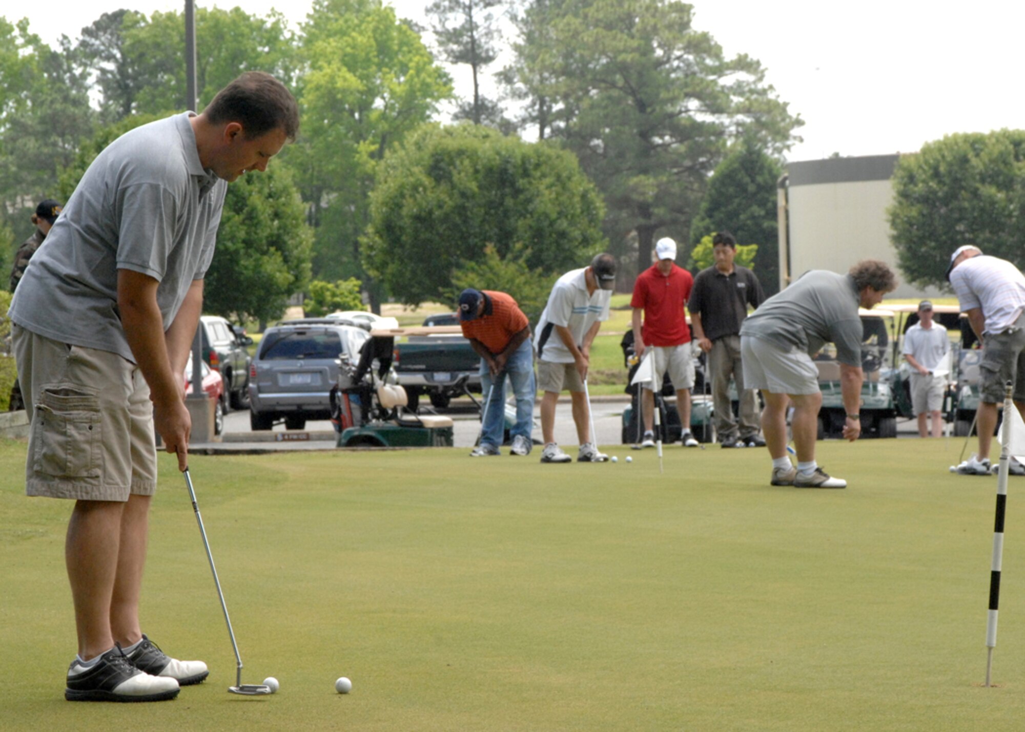 Members of the 4th Fighter Wing play golf at Seymour Johnson Air Force Base, North Carolina on May 16, 2008 as part of the 2008 Safety Day Golfing Tournament. The Tournament is held to promote safety and to bring members of the 4th Fighter Wing together. (U.S. Air Force photo by Airman First Class Jonathon Williams)(released)