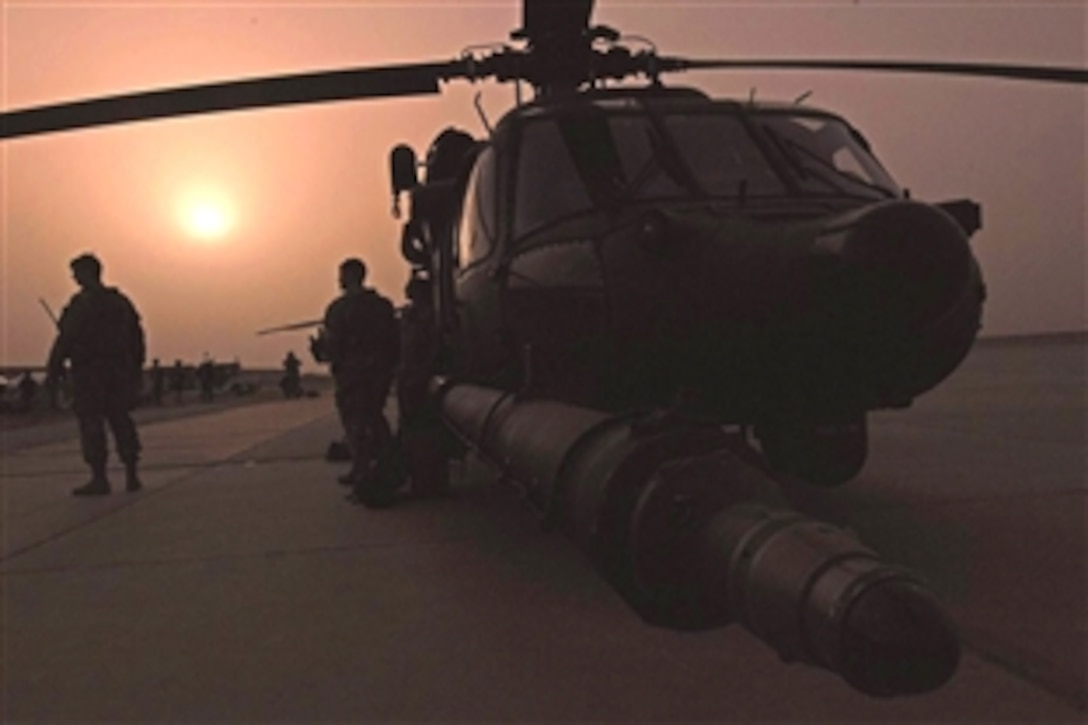 Iraqi Special Operations Forces prepare for a mission to disrupt weapons smuggling in the area by Iranian trained criminals, Balad, Iraq, May 10, 2008. .  