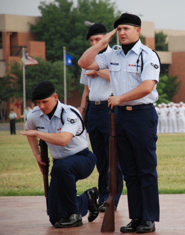 Sheppard's Special Activities Team Precision Rifle Drill Team performs in celebration of Armed Forces Day at the Armed Forces Day Parade May 23 . The parade started Sheppard's Armed Forces Day events, which culminated with a luncheon. (U.S. Air Force photo/Airman 1st Class Candy Miller)