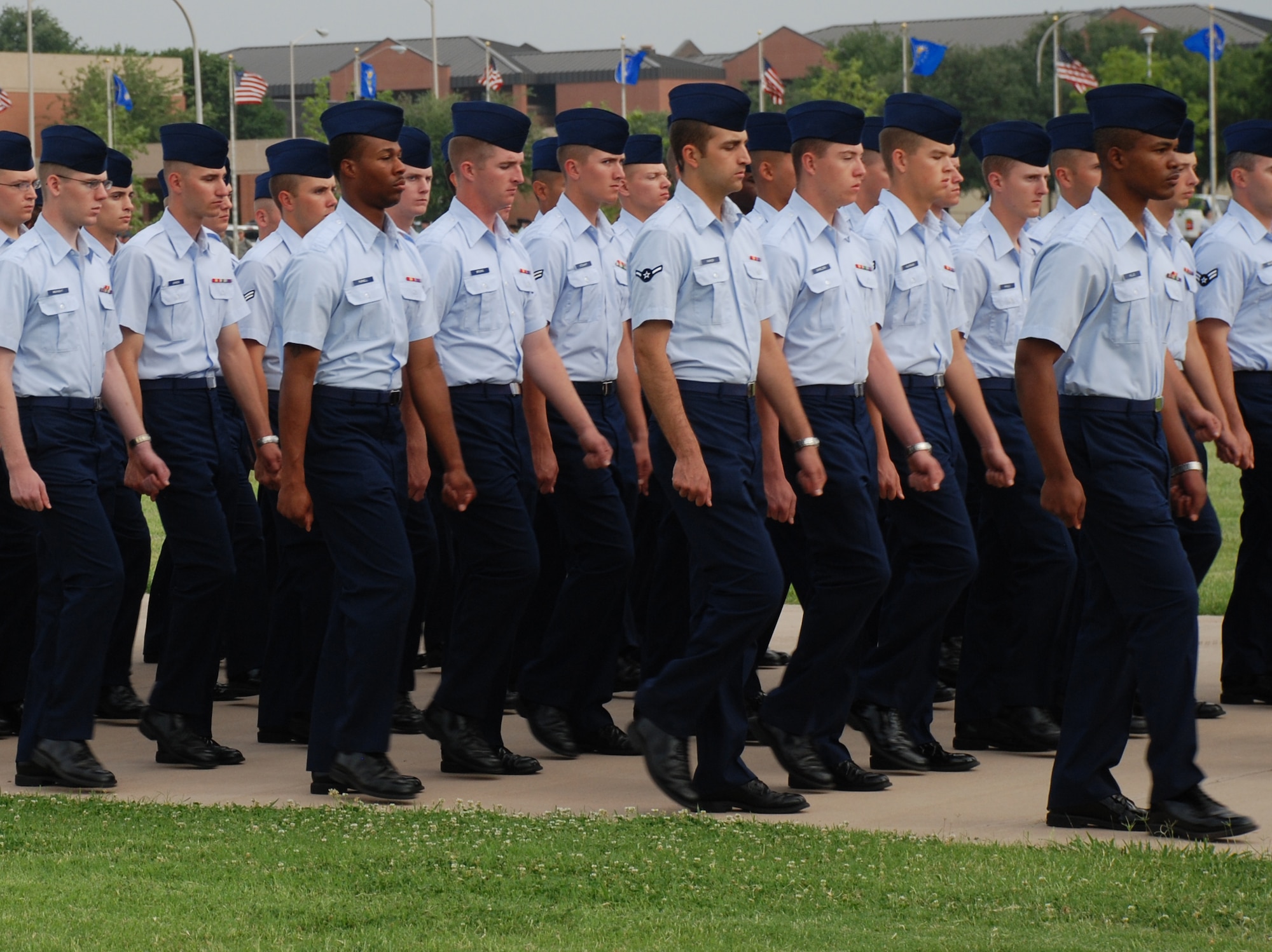 Airmen in training celebrate Armed Forces Day by marching in the Armed Forces Day Parade May 23 . The parade started Sheppard's Armed Forces Day events, which culminated with a luncheon. (U.S. Air Force photo/Airman 1st Class Candy Miller)