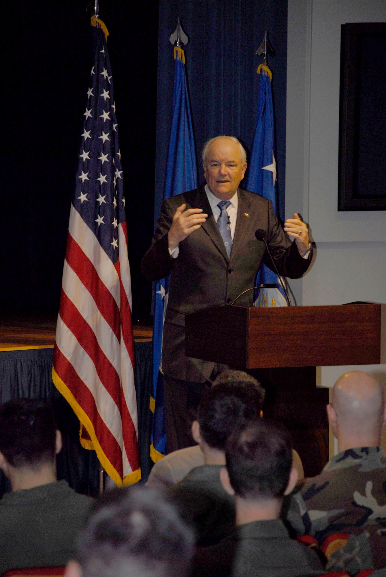 Secretary of the Air Force Michael W. Wynne addresses a crowd of Airmen during an Air Staff Call May 22 at the Pentagon. The Secretary held the call to encourage Airmen who have served on the Air Staff to carry their knowledge and expertise of Air Force policy to their follow-on assignments in the field. (U.S. Air Force photo/Staff Sgt. Monique Randolph)

