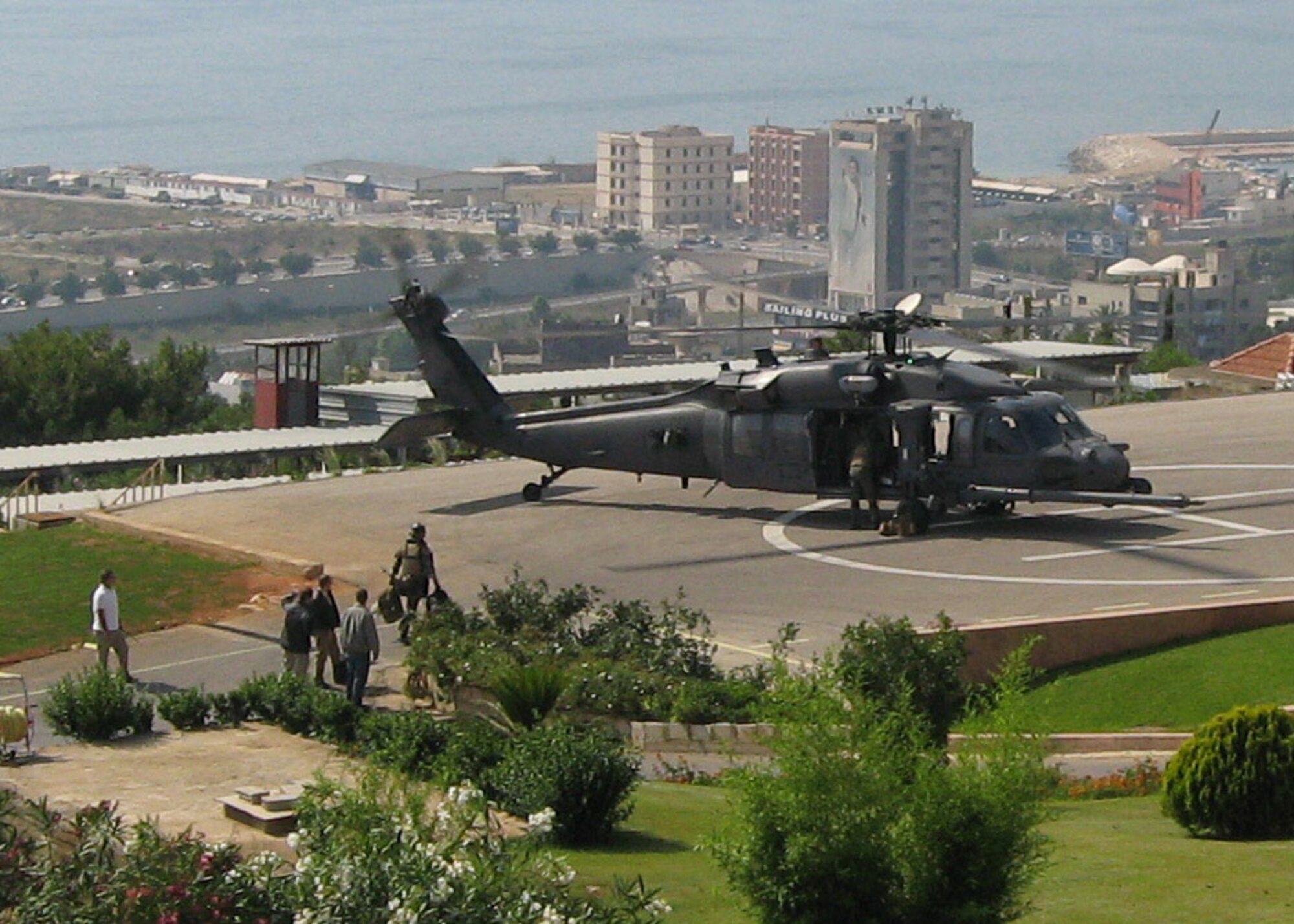 BEIRUT — U.S Air Force airmen load a U.S Air Force HH-60G Pave Hawk helicopter before take-off at the U.S. Embassy in here May 19. The Air Force's 56th Rescue Squadron and the U.S. Navy's Joint Maritime Ashore Support Team and Task Force 362 deployed to Royal Air Force Cyprus early last week to provide potential re-supply support to the U.S. Embassy in Beirut if requested. (Department of Defense photo by Air Force Lt. Col. Neil Eisen)
