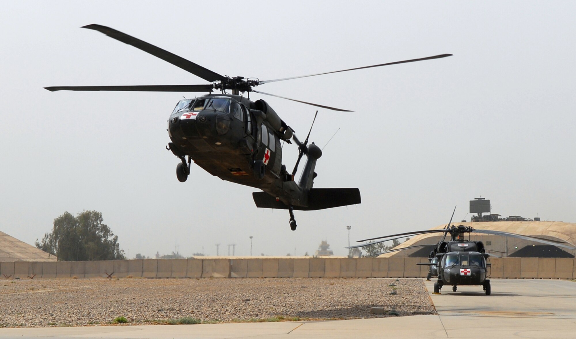 BALAD AIR BASE, Iraq -- A U.S. Army Blackhawk helicopter takes off to respond to a medical evacuation call here, May 5. U.S. Army medical evacuation crews, from the 7th Battalion, 101st Aviation Regiment assigned to Balad Air Base, are a critical link in the chain of events to ensure patients in Iraq are transported to the next echelon of care within one hour of being injured. Critically injured servicemembers and civilians are often brought to the Air Force Theater Hospital at Balad AB for treatment. The 7th Battalion, 101st Aviation Regiment is deployed from Fort Campbell, Ky. (U.S. Air Force photo/ Senior Airman Julianne Showalter)
