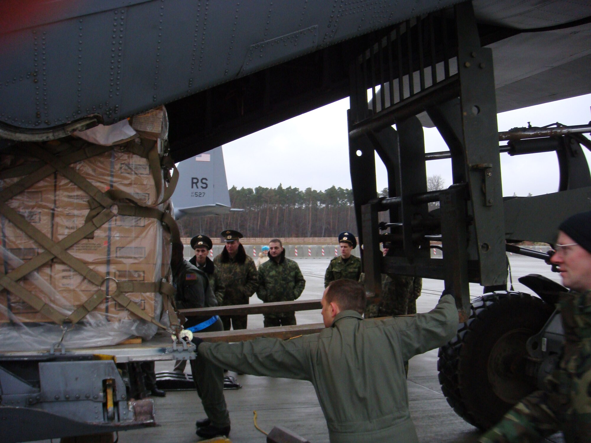 Members of the 86th Airlift Wing demonstrate C-130 uploading operations with visiting Russian Air Force delegation members in November of 2007 on Ramstein Air Base, Germany.  