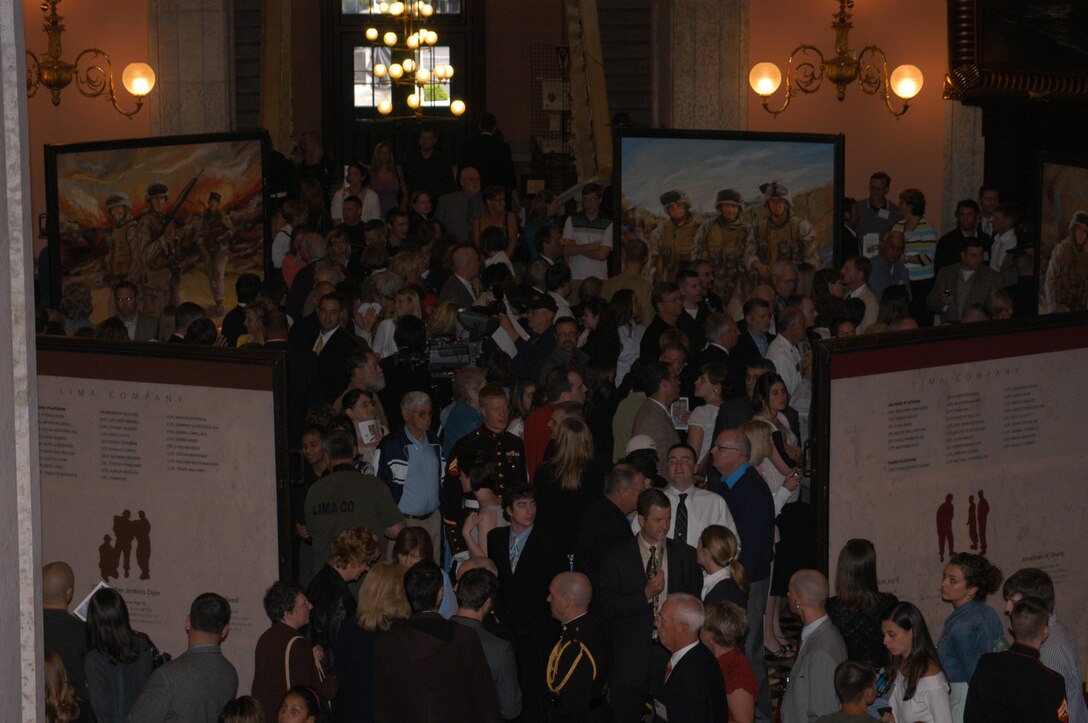 The "Lima Company Memorial: A remembrance of Spirit & Choice" consists of life-size portraits of the 22 Marines and a Navy corpsman from Company L, 3rd Battalion, 25th Marine Regiment, who died while serving in Iraq in 2005. The memorial will be on display in the statehouse until Veteran's Day. (Official U. S. Marine Corps photo by Sgt. G. S. Thomas)
