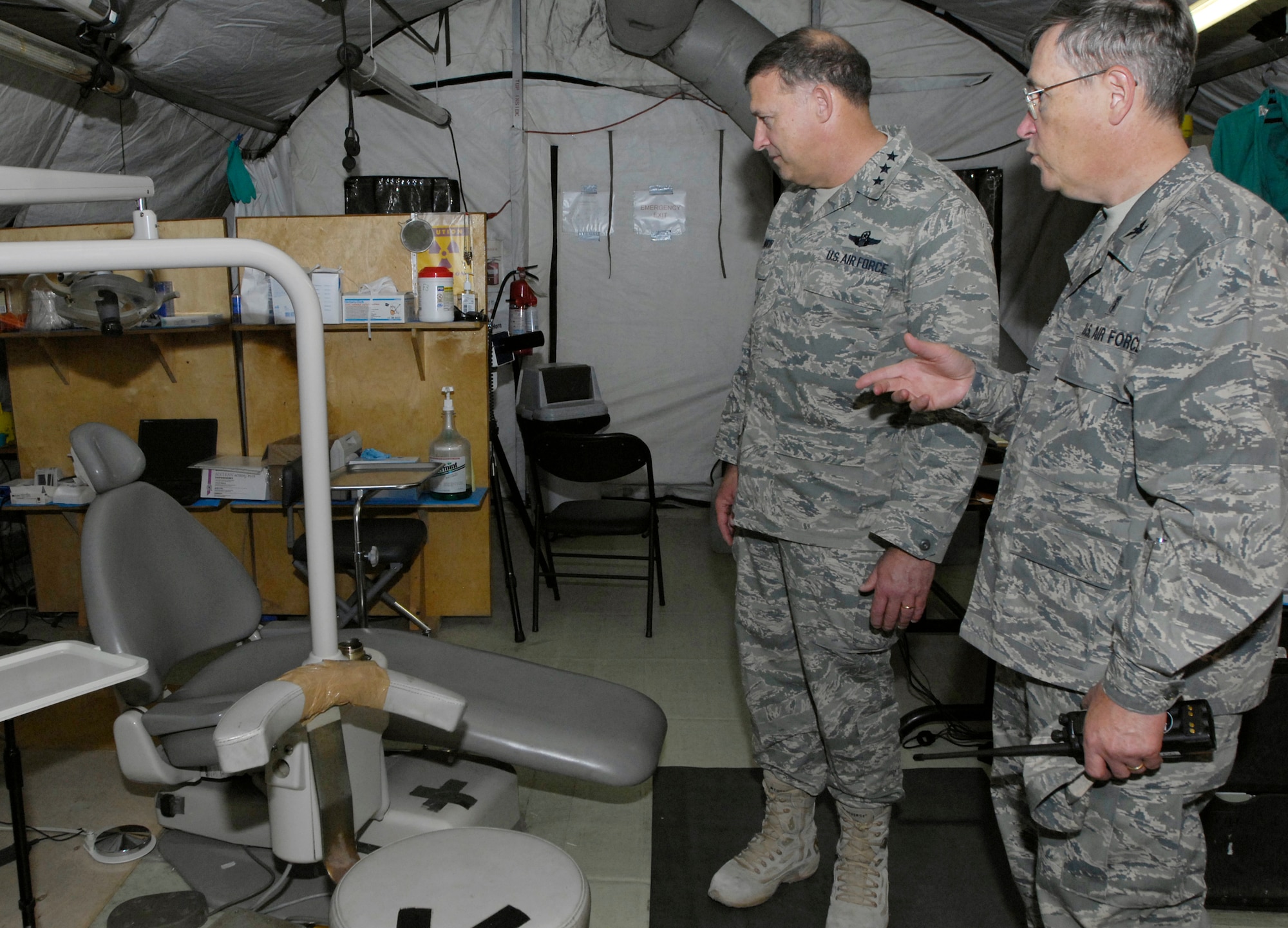 (08/05/21) MANAS AB, KYRGYZSTAN -- Col. Grace,376th Expeditionary Medical Group commander, Manas Air Base, Kyrgyz Republic, shows Lt. Gen. Gary North, Combined Forces Air Component Commander for U.S. Central Command,  new dental equipment the base received during his visit to Manas AB on May 21.  The general visited Airmen and local workers across the base and hosted a commander's call during his brief stop at Manas AB.  (USAF Photo by SSgt Tabitha Kuykendall//Released)