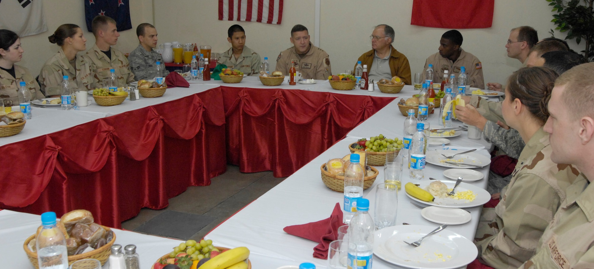(08/05/21) MANAS AB, KYRGYZSTAN -- Retired Lt. Gen. Joseph Hurd, senior Air Force mentor, and Lt. Gen. Gary North, Combined Forces Air Component Commander for U.S. Central Command, meet with Airmen of the 376th Air Expeditionary Wing, Manas Air Base, Kyrgyz Republic, for breakfast during his visit to Manas AB on May 21.  The CFACC visited Airmen and local workers across the base and hosted a commander's call during his brief stop at Manas AB.  (USAF Photo by SSgt Tabitha Kuykendall//Released)
