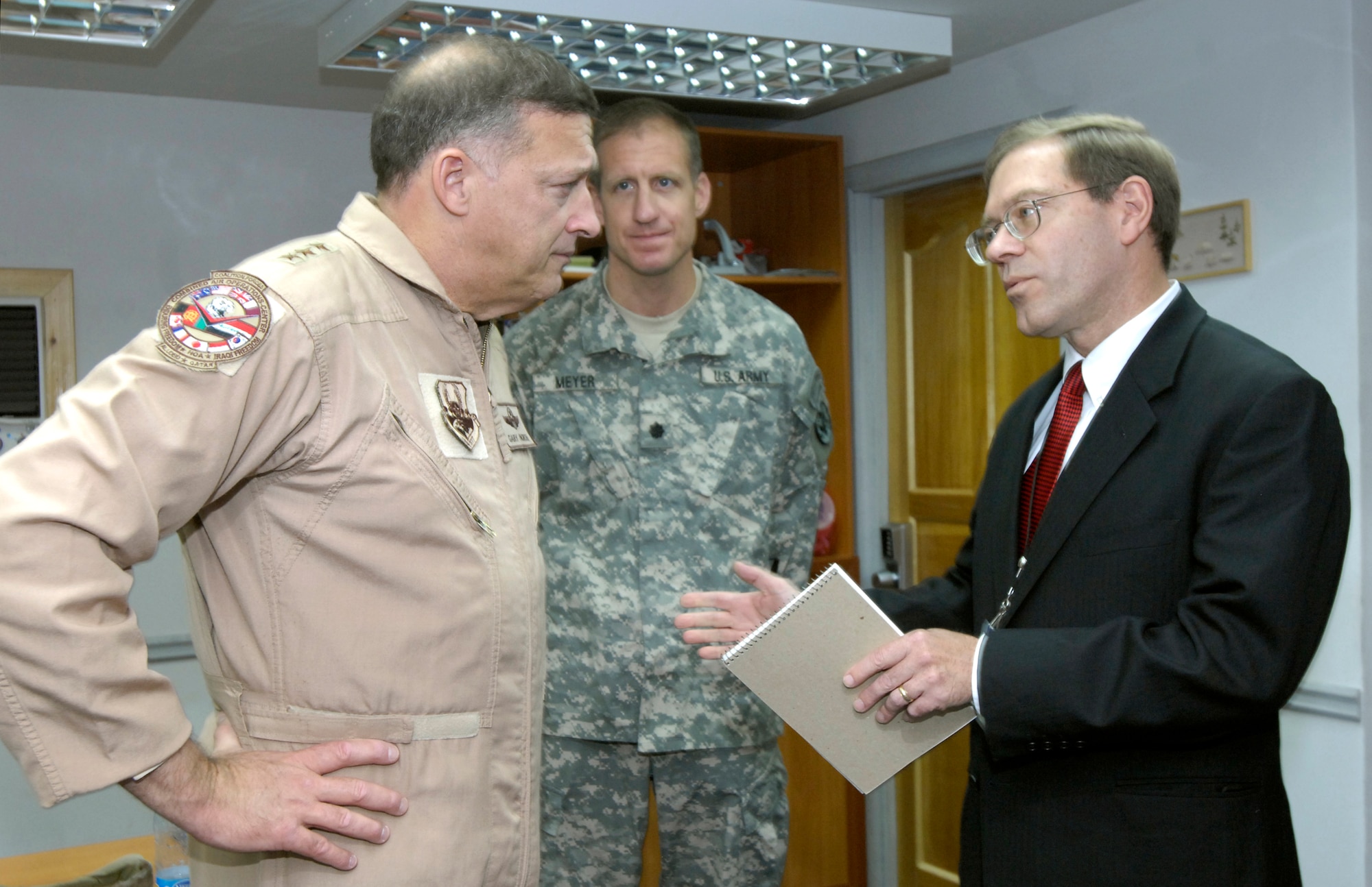 (08/05/21) MANAS AB, KYRGYZSTAN -- Lee Litzenberger, Deputy Chief of Mission, U.S. Embassy Bishkek, Kyrgyzstan, discuss host nation relations with Lt. Gen. Gary North, Combined Forces Air Component Commander for U.S. Central Command, during his visit to Manas AB on May 21.  The general visited Airmen and local workers across the base and hosted a commander's call during his brief stop at Manas AB.  (USAF Photo by SSgt Tabitha Kuykendall//Released)