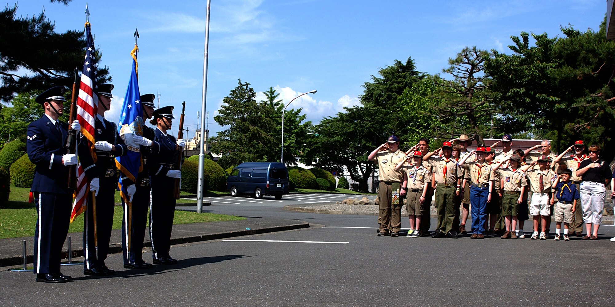 YOKOTA AIR BASE, Japan - Boy Scout Troop 45 salutes the colors during the American Legion Memorial Day ceremony on May 26. The American Legion holds the ceremony every year in honor of those who died in service. (U.S. Air Force photo by Airman 1st Class Jonathan Fowler)                               