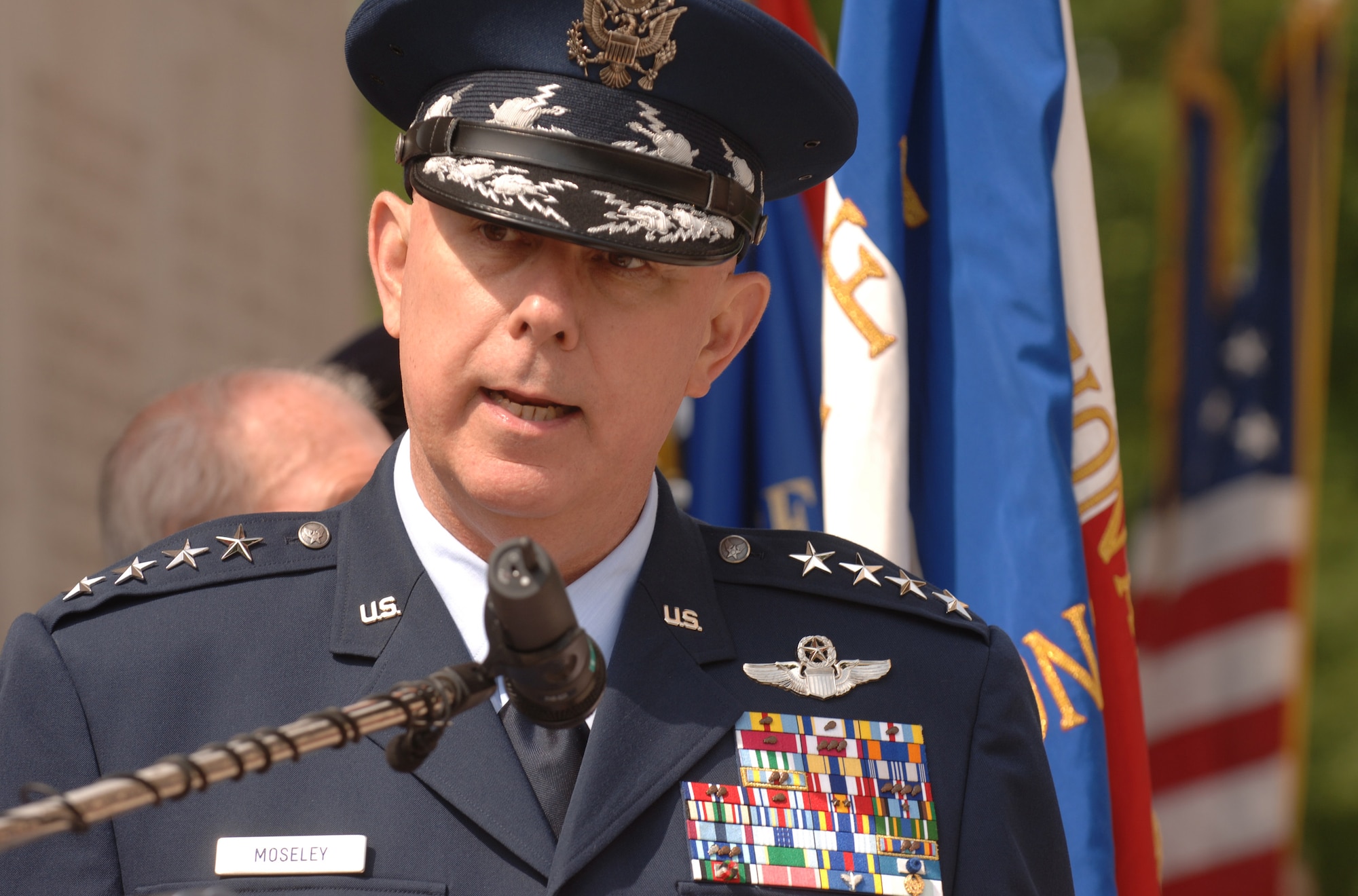 Air Force Chief of Staff Gen T. Michael Moseley speaks during the Lafayette Escadrille memorial ceremony outside of Paris May 24 where French and American citizens pay homage to the United States' first combat aviators. The all-American squadron of volunteers flew under the French flag during World War I, and many gave their lives in defense of French democracy. (U.S. Air Force photo/Master Sgt. Scott Wagers)