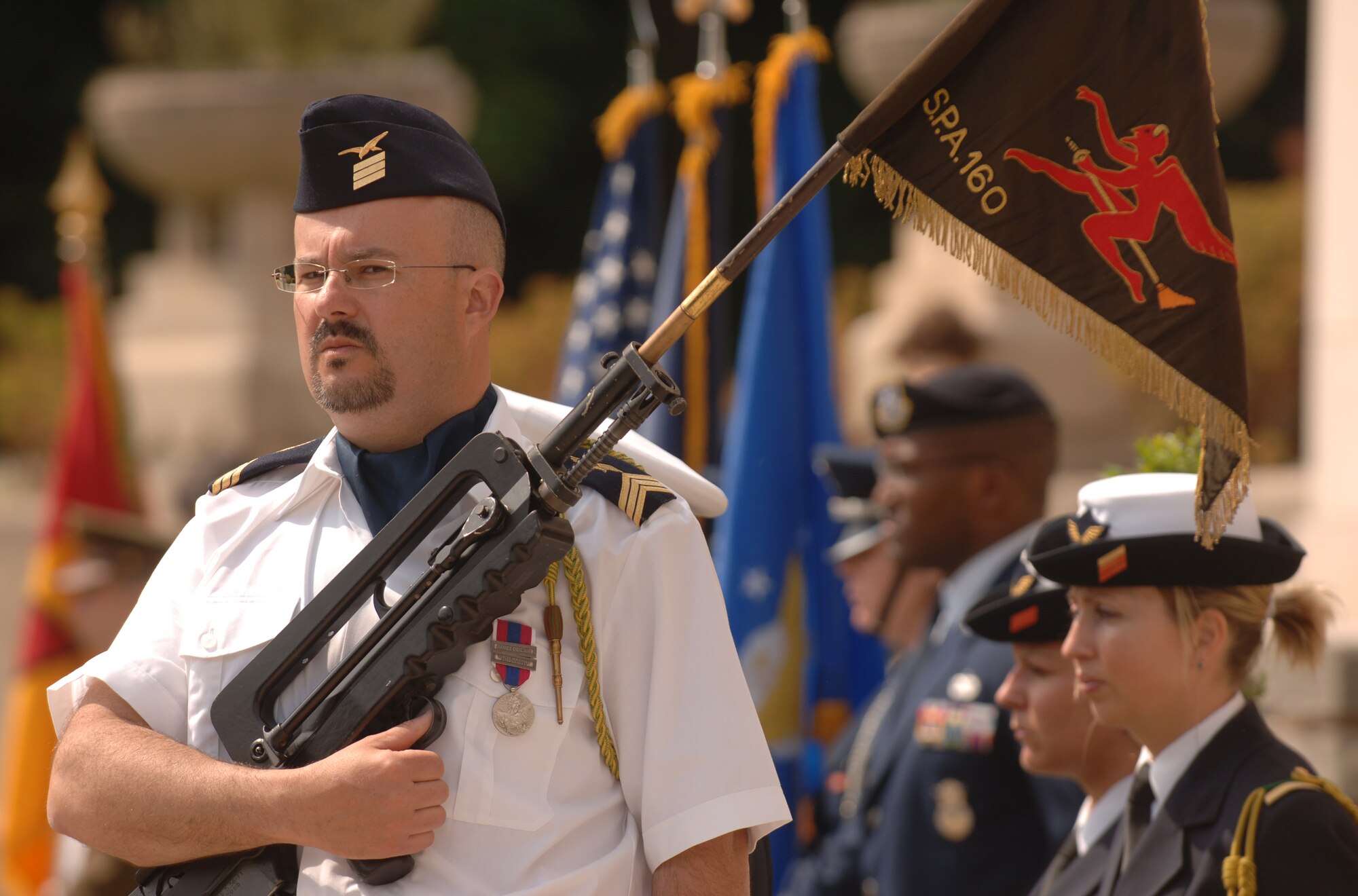 Ludovic Quenin, a French air force non-commissioned officer, takes part in the Lafayette Escadrille memorial ceremony outside of Paris May 24 where French and American citizens paid homage to an all-American squadron of volunteer pilots who flew under the French flag during World War I, and many gave their lives in defense of French democracy. (U.S. Air Force photo/Master Sgt. Scott Wagers)