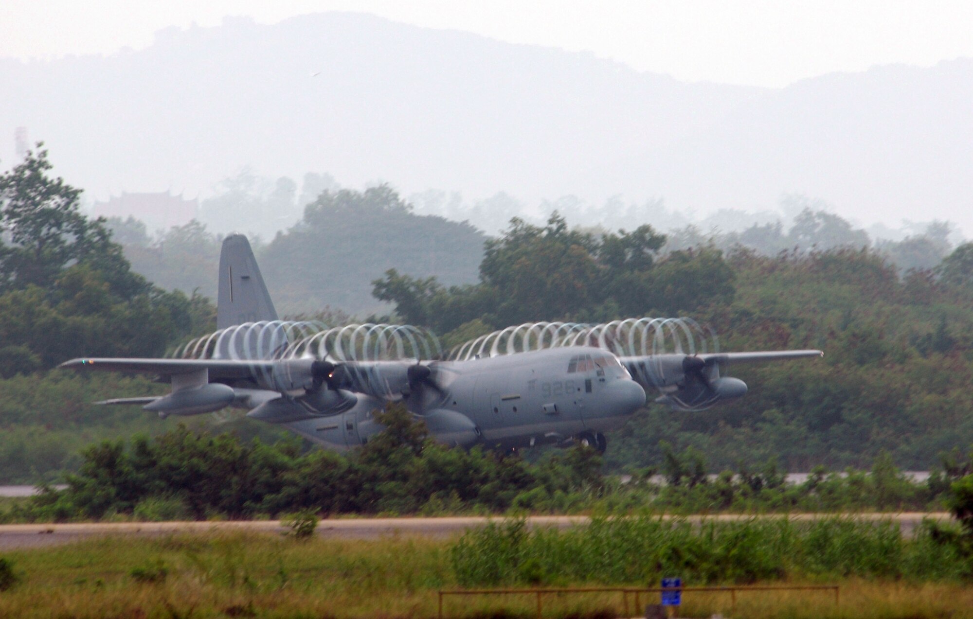 A United States Air Force C-130 Hercules from Yokota Air Base Japan leaves UTAPAO-International Airport Thailand in an effort to supply aid to the people of Myanmar on 15 May. (United States Air Force photo by Senior Airman Kimball)