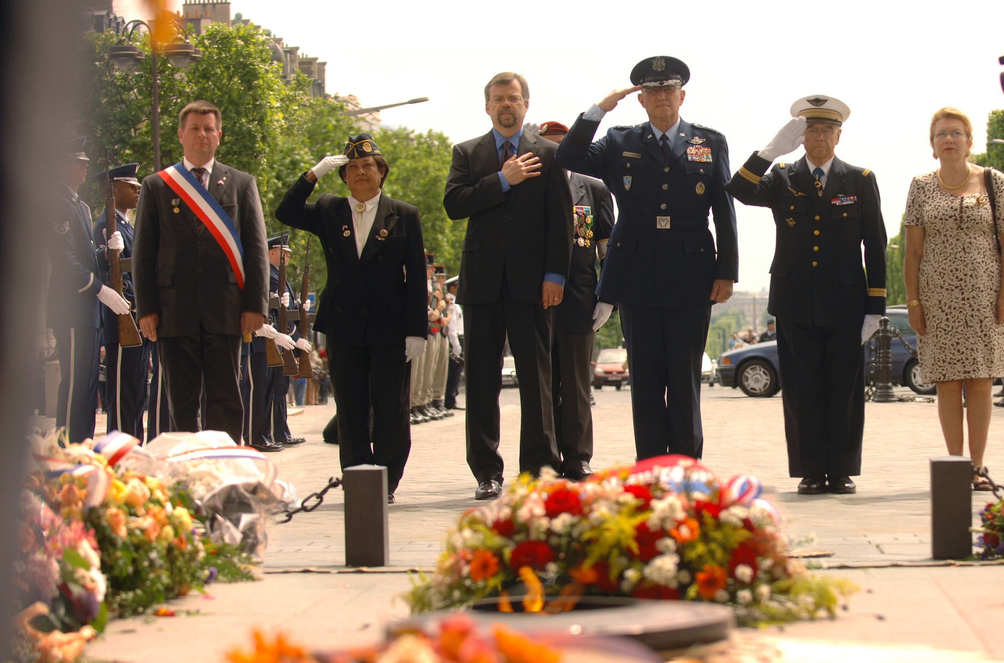 After laying a wreath on the Tomb of the Unknown Soldier, May 25, underneath the Arc de Triomphe in Paris, U.S. Air Forces Europe Commander, Gen. Roger Brady pays final respects with (2nd from left to right)) American Legion's Post No. 1 Commander, Clarita Georghegan, Deputy Chief of Mission, U.S. Embassy, Paris, Mark A. Pekala, Assist. Military Commander of Paris, French Army Colonel (name unknown), and Genevieve de La Pomelie, a seventh-generation descendant of General La Fayette. (U.S. Air Force photo by Master Sgt. Scott Wagers)