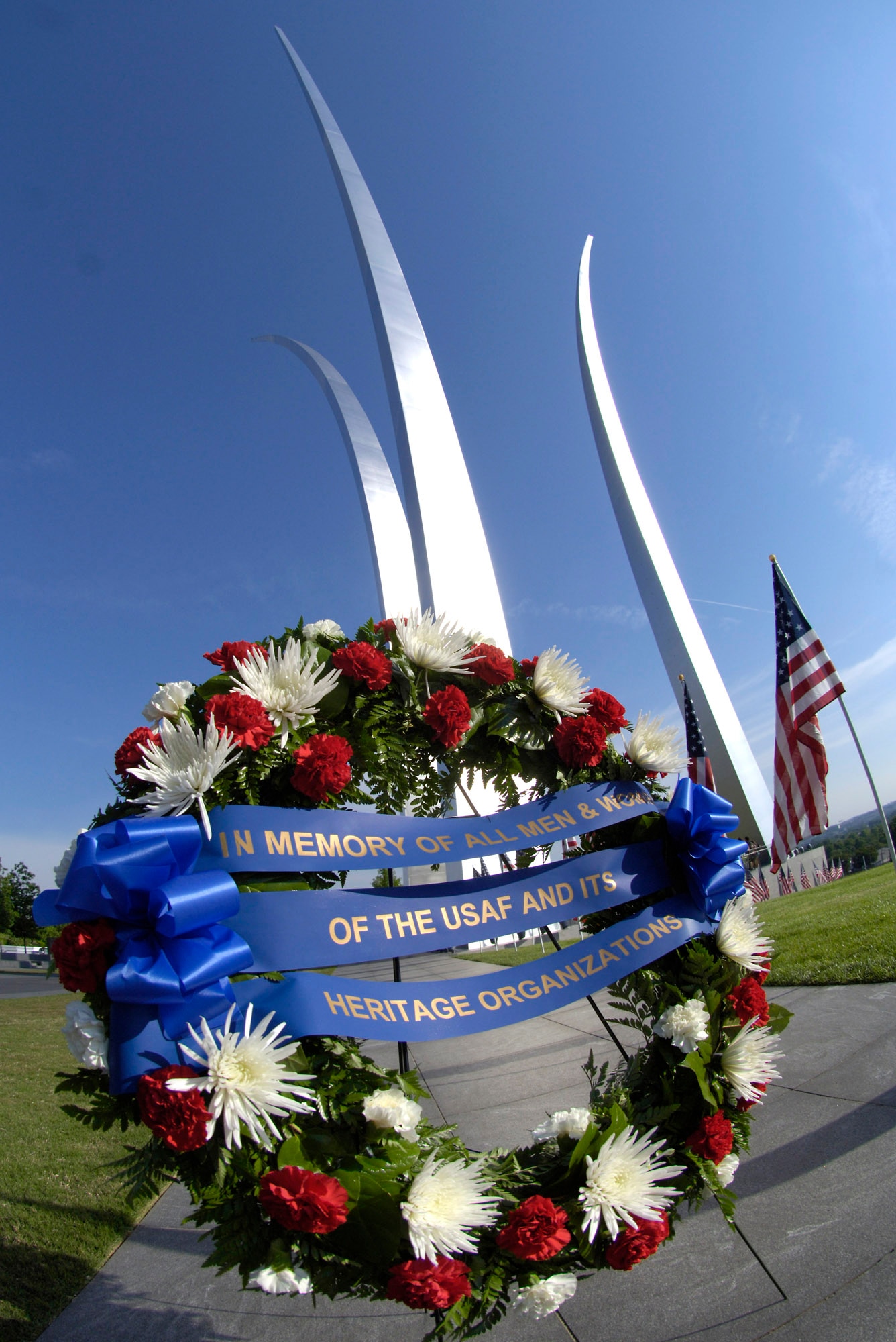 A wreath from a Memorial Day ceremony  is displayed in front of the Air Force Memorial. Attendees at the event paid tribute to the more than 55,000 Airman, since World War One, who have given their lives in service to their country, Washington, D.C., May 26, 2008. The ceremony was co-sponsored by the Air Force Association and Air Force Sergeants Association. (U.S. Air Force photo by Master Sgt. Jim Varhegyi)

