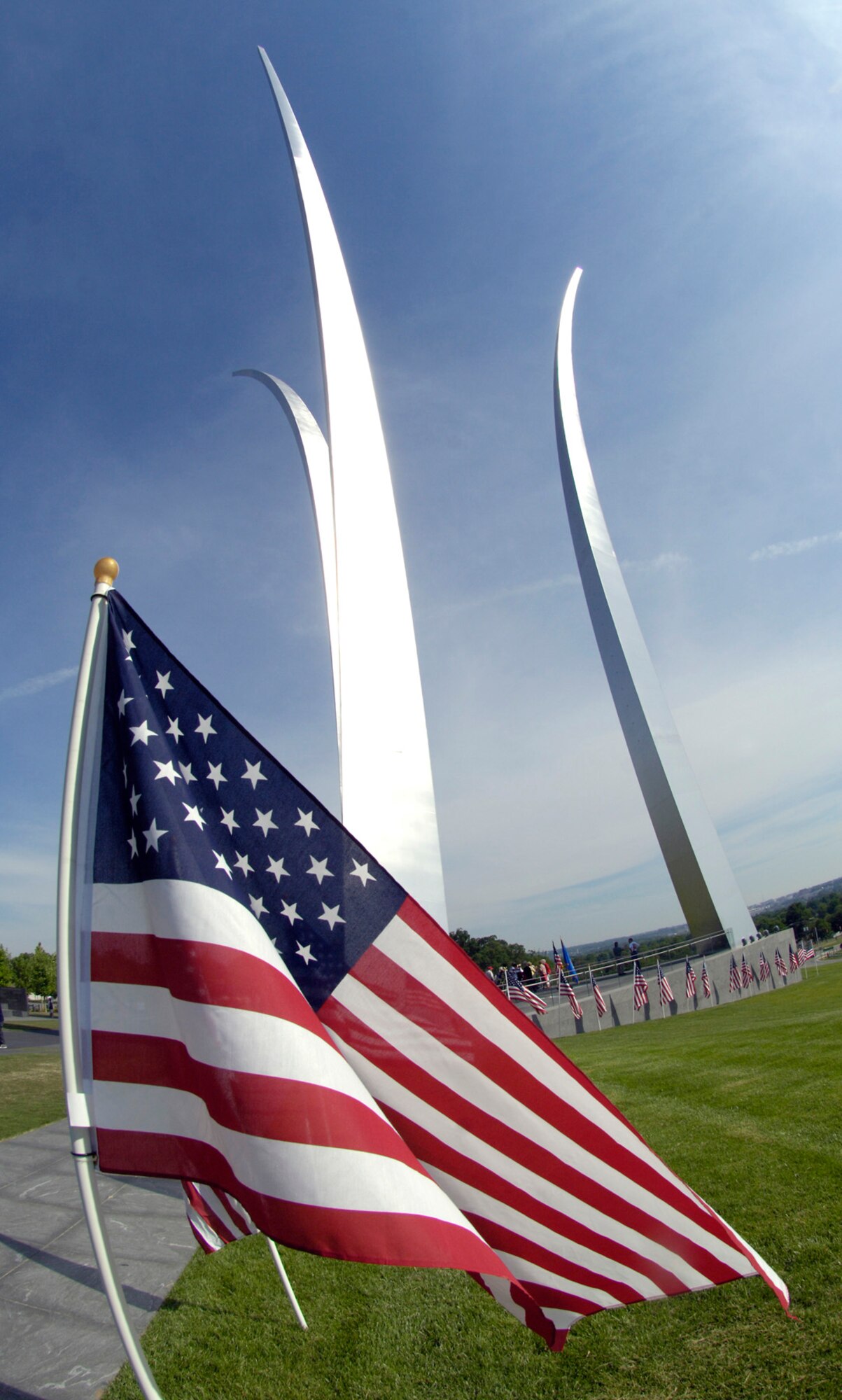 A flag from a Memorial Day ceremony is displayed in front of the Air Force Memorial at Washington, D.C., May 26, 2008. Attendees at the event paid tribute to the more than 55,000 Airman, since World War I, who have given their lives in service to their country.  The ceremony was co-sponsored by the Air Force Association and Air Force Sergeants Association. (U.S. Air Force photo by Master Sgt. Jim Varhegyi)

