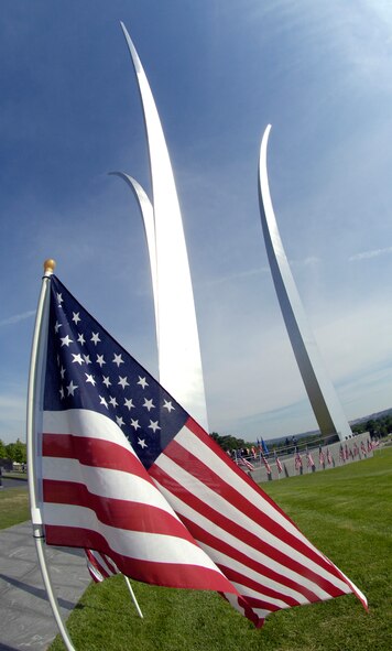 A flag from a Memorial Day ceremony is displayed in front of the Air Force Memorial at Washington, D.C., May 26, 2008. Attendees at the event paid tribute to the more than 55,000 Airman, since World War I, who have given their lives in service to their country.  The ceremony was co-sponsored by the Air Force Association and Air Force Sergeants Association. (U.S. Air Force photo by Master Sgt. Jim Varhegyi)


