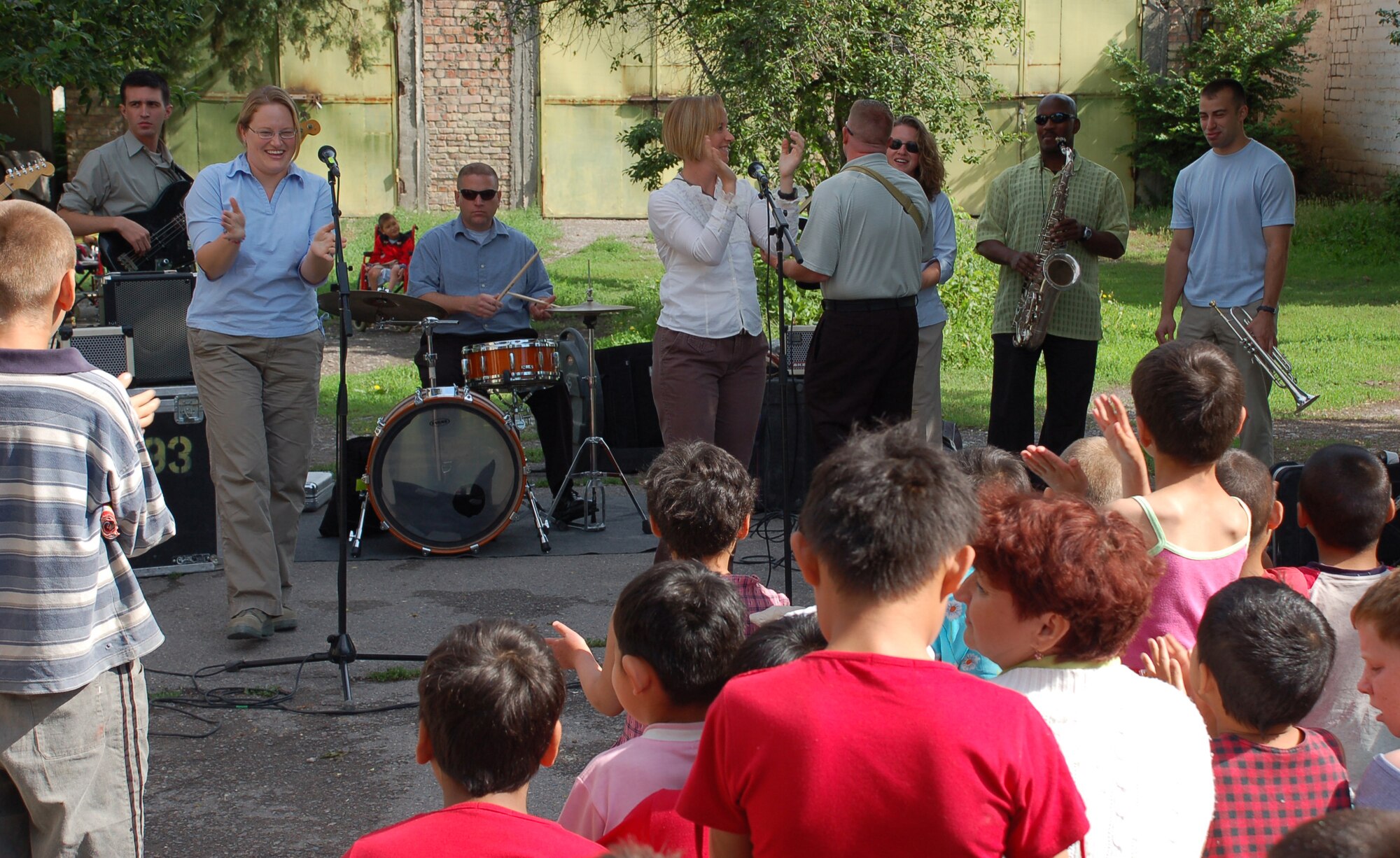 (08/05/25) MANAS AB, KYRGYZSTAN -- U.S. Air Forces Central Band Thunder Roll, performs at the Belovodosky Orphanage.  The AFCENT band performed at the orphanage and explained the different instruments the band uses during their visit.  (U.S. Air Force/TSgt Jerome Baysmore/ Released)