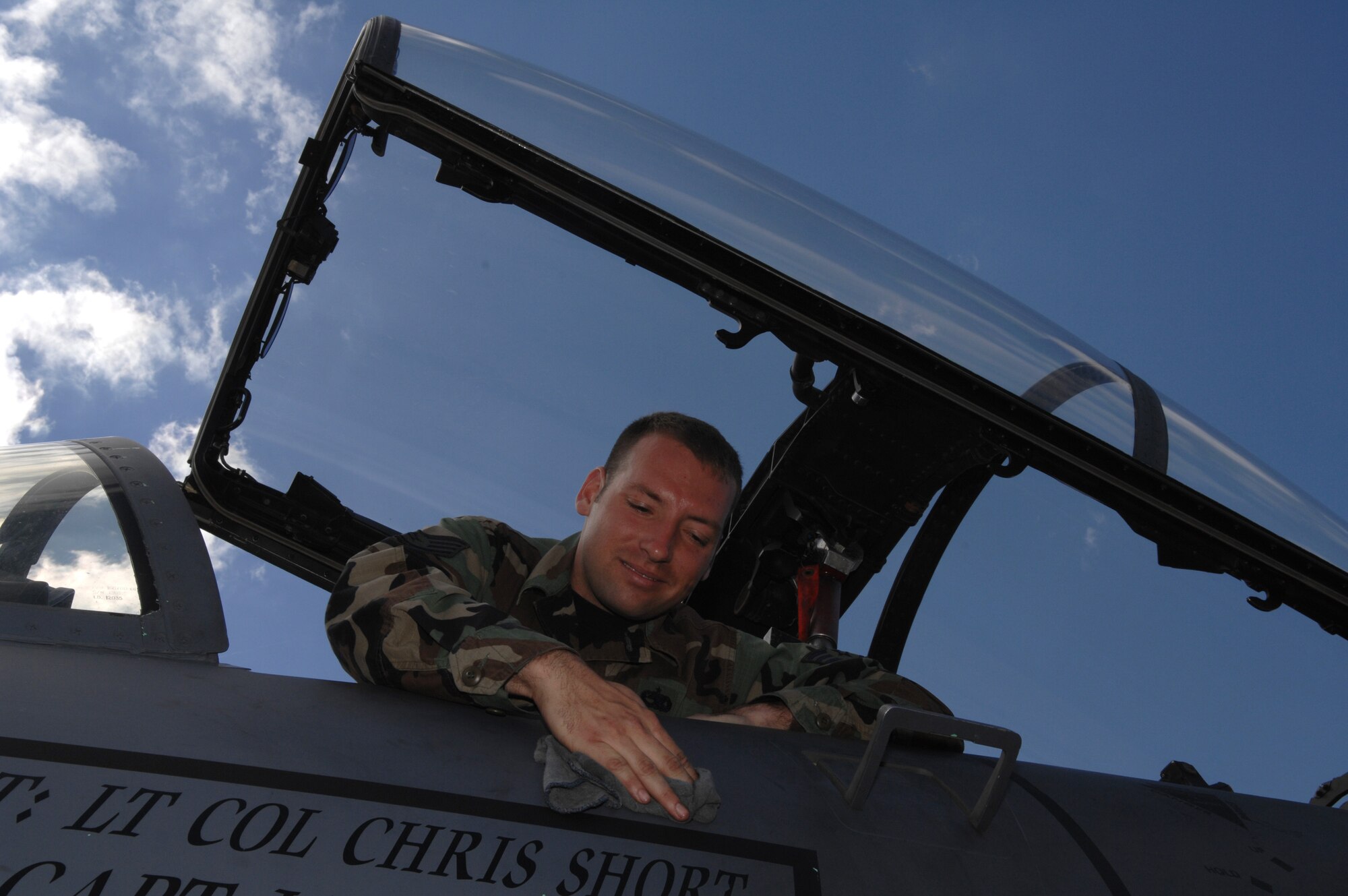 BERLIN, Germany - Staff Sgt. Eric Lackey, an aircraft maintenance crew chief, cleans the exterior of an F-15E Strike Eagle from the 48th Fighter Wing, Royal Air Force Lakenheath, United Kingdom here May 25 in preparation for the 2008 Berlin Air Show. U.S. participation in the Berlin Air Show enhances the U.S.-German military-to-military relationship and supports our security cooperation strategic direction efforts. (U.S. Air Force photo by Tech. Sgt. Corey Clements) (released)