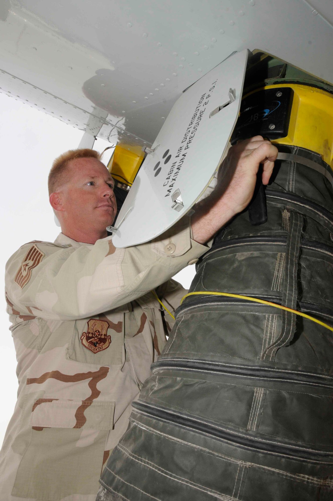 SOUTHWEST ASIA—Tech. Sgt. James Hanchett, 379th Expeditionary Aircraft Maintenance Squadron airborne surveillance radar maintainer, works on an a Joint STARS aircraft here. He and a team of about 50 air and ground specialists in more than six career fields work together with Army, Air National Guard, and Air Force Reservists to get the J-STARS mission done every day. (U.S. Air Force photo/ Senior Airman Domonique Simmons)
