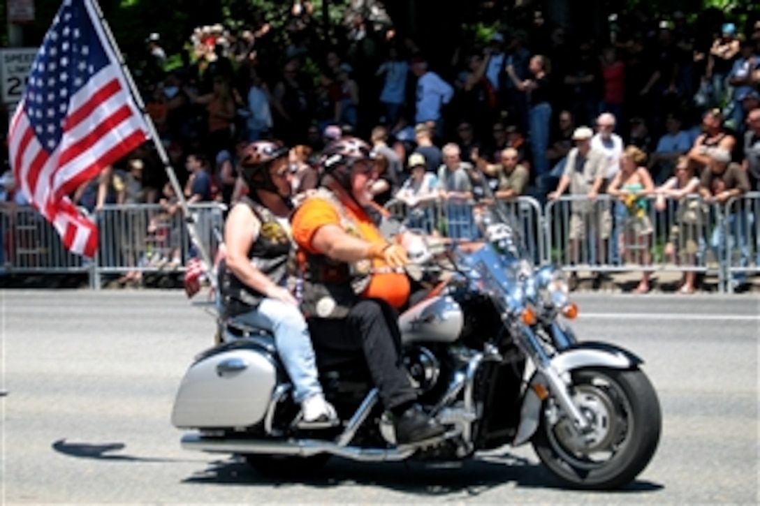 Motorcycle riders cruise through Washington, D.C., during the 21st Rolling Thunder Ride for Freedom, May 25, 2008. The bikers ride to raise awareness about prisoners of war, troops missing in action and veterans' benefits. 