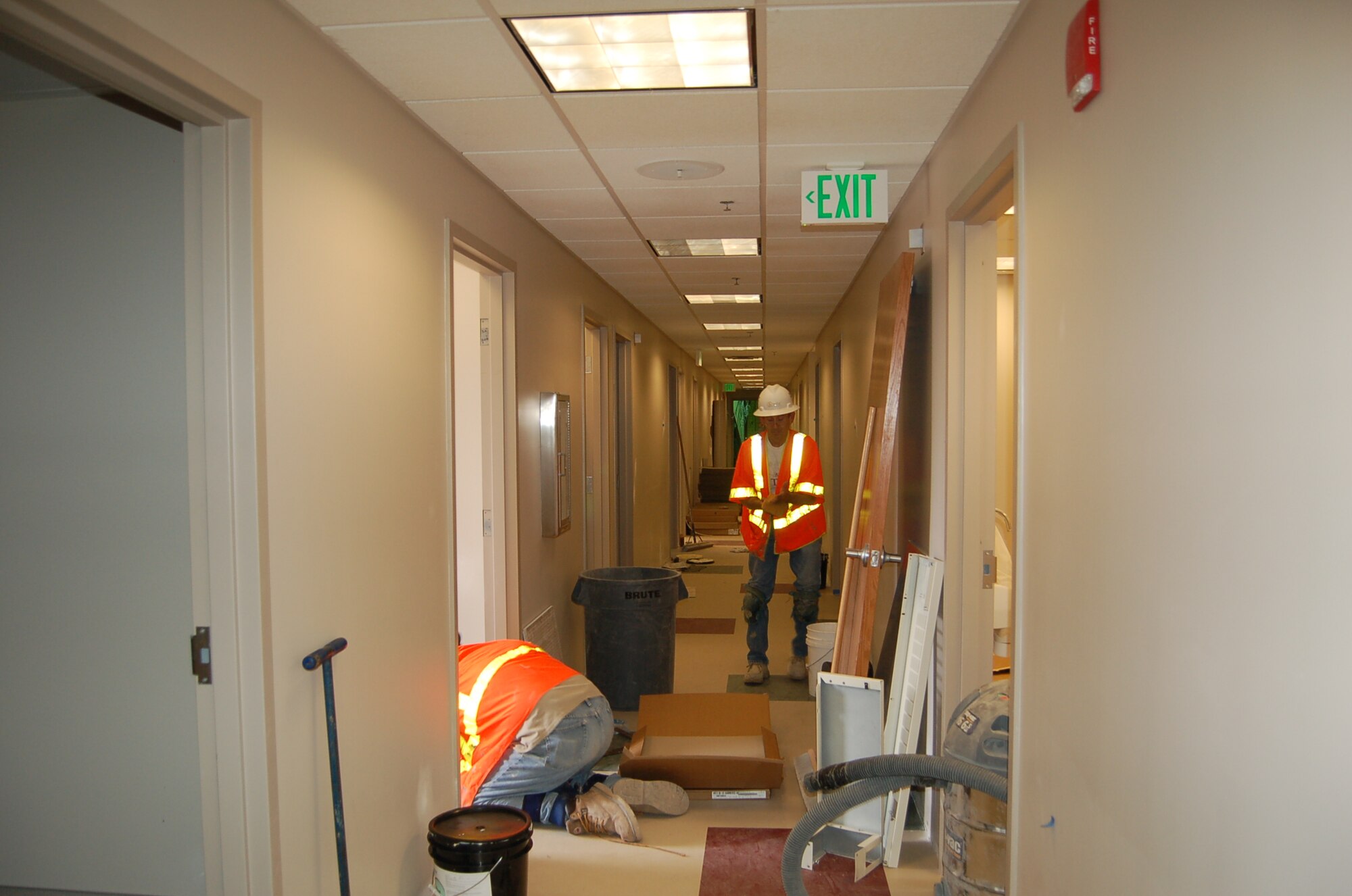 Construction workers put finishing touches on a new women’s health clinic at Peterson’s medical clinic. The clinic is undergoing a $12 million renovation and expansion to give the 21st Space Wing’s medical group and its patients more room. (U.S. Air Force photo by Ms. Corey Dahl)