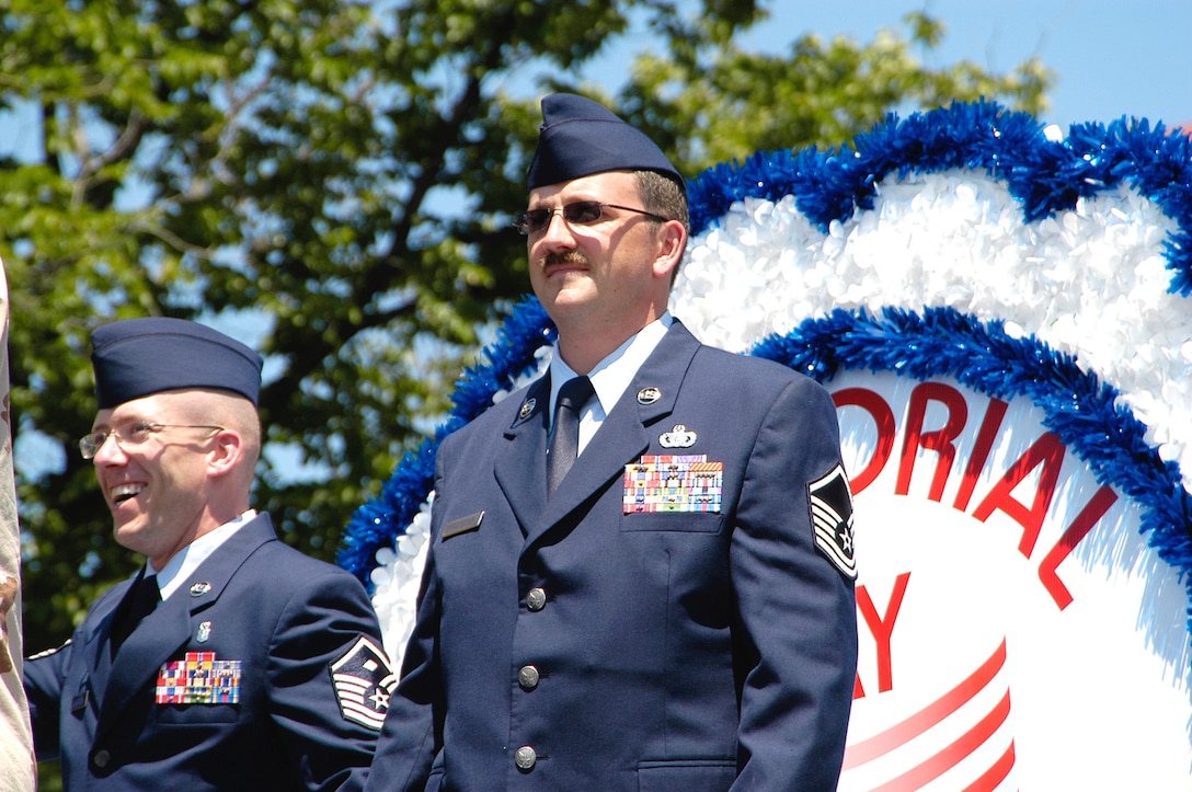 Special Agent (Master Sgt.) Jac Christiansen (right) was awarded the Bronze Star, Purple Heart and Air Force Combat Action Medal for leading 158 counter-improvised explosive device missions and other actions in Iraq. (U.S. Air Force photo/Tech. Sgt. John Jung)