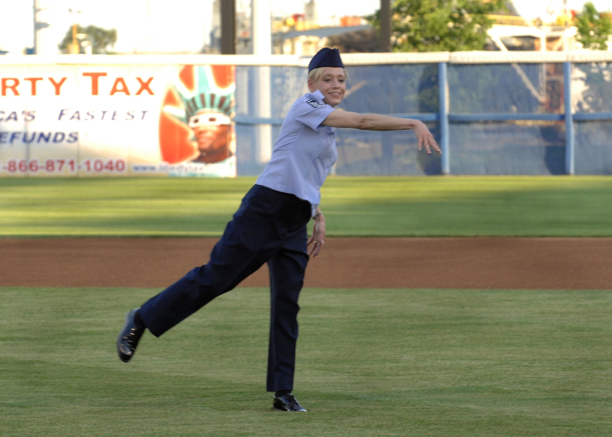 LANGLEY AIR FORCE BASE, Va. -- Master Sgt. Tracy King, 1st Medical Group, throws the opening pitch to start off Military Appreciation Night at Harbor Park in Norfolk, Va., home of the Norfolk Tides Baseball team May 22. The Tides host an annual military appreciation night in support of the armed services.  (U.S. Air Force photo/Airman Rebecca Montez)
