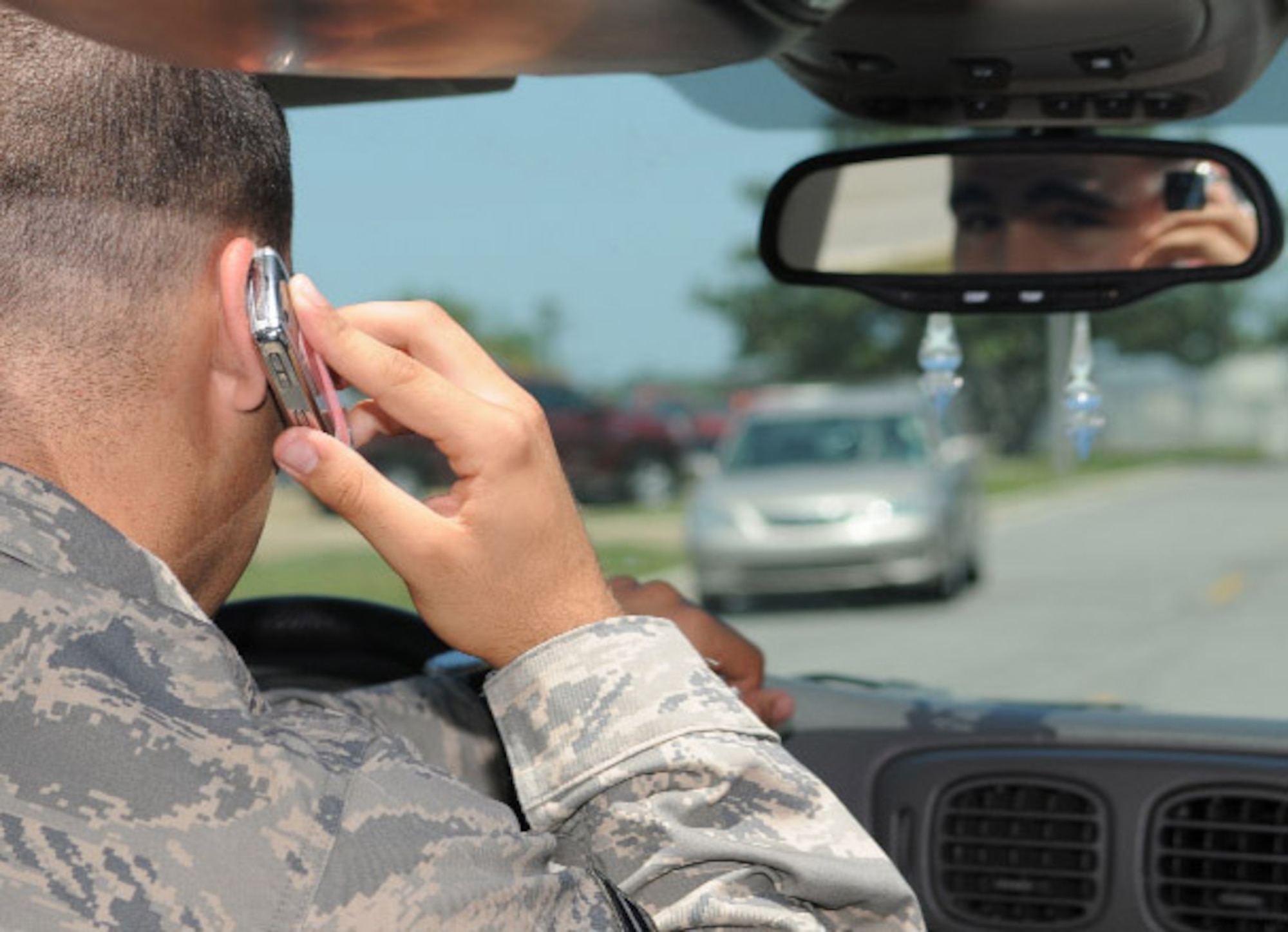 It’s a primary offense to use a cell phone while driving on base without a hands-free device.  Violators can be stopped and ticketed for this offense by the 81st Security Forces Squadron.  (U.S. Air Force photo by Kemberly Groue)
