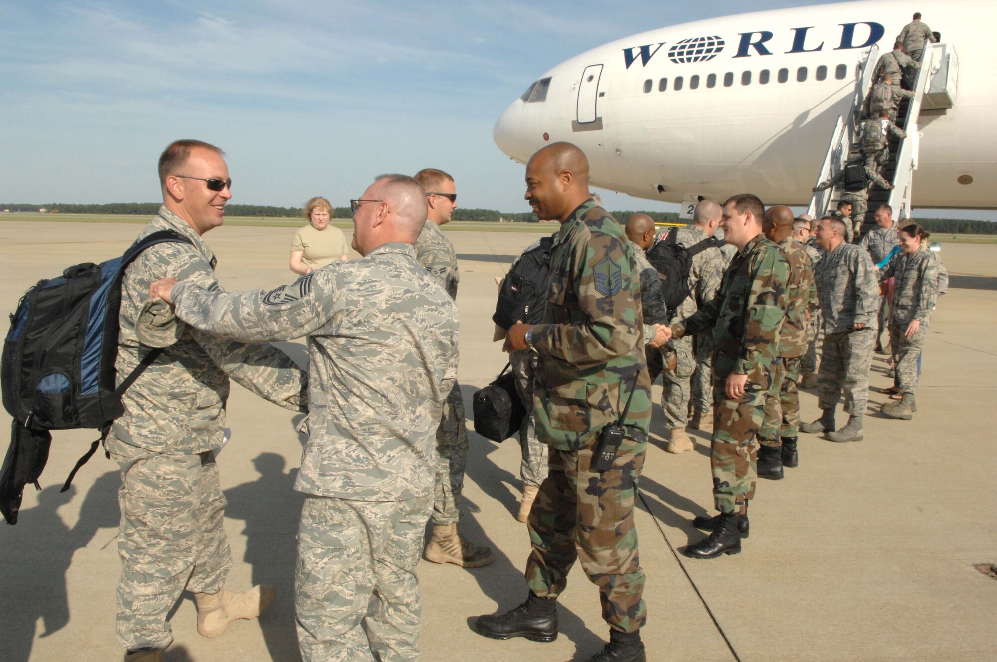 SHAW AIR FORCE BASE, S.C. -- Airmen from the 77th Fighter Squadron receive their goodbyes from 20th Fighter Wing leadership during their deployment departure on May 22. More than 200 Airmen and a dozen F-16s from the 20th Fighter Wing deployed to Southwest Asia to support the Global War on Terrorism. (U.S. Air Force photo/Airman 1st Class Matthew Davis)