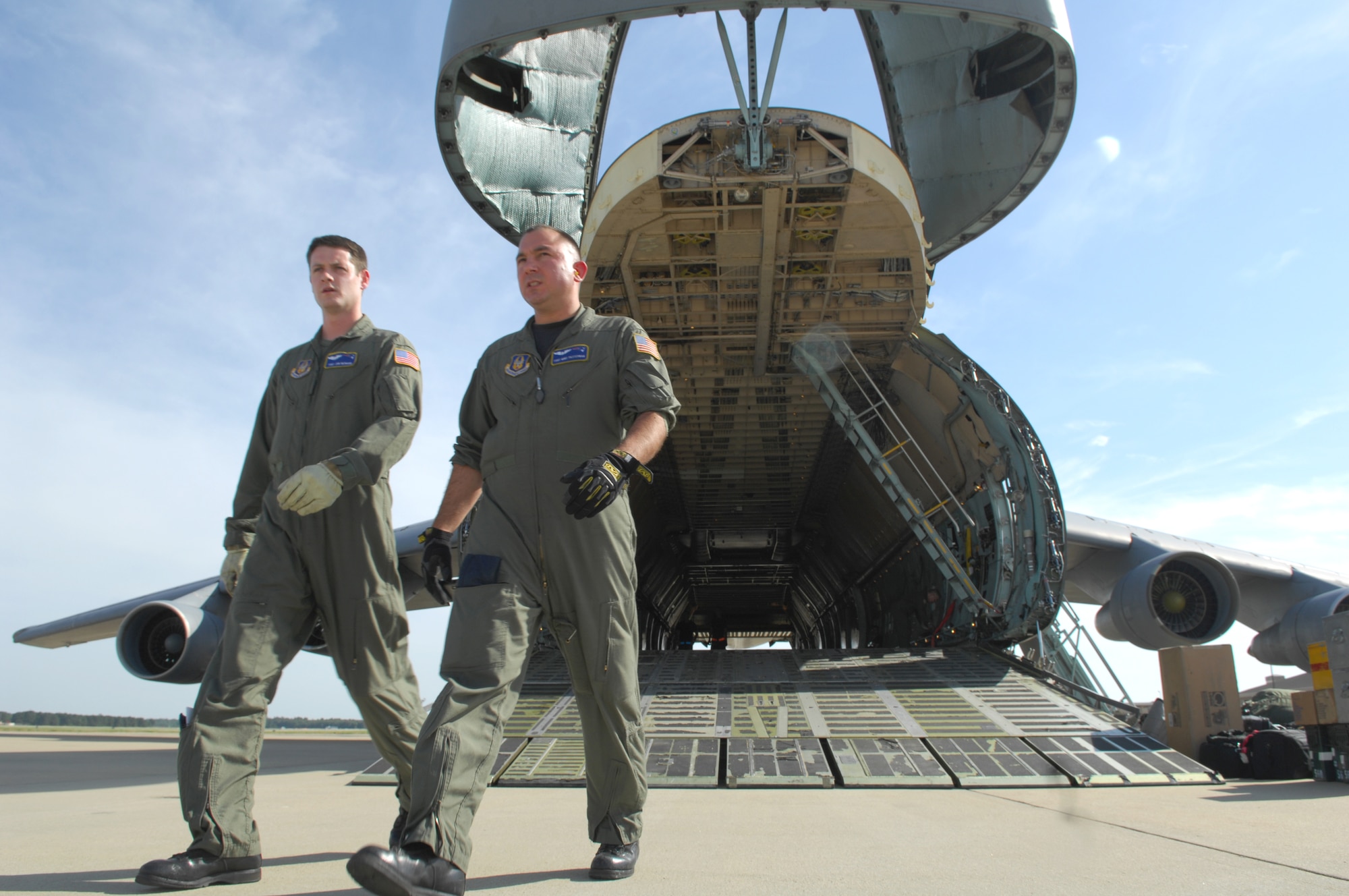 SHAW AIR FORCE BASE, S.C.--  Tech. Sgts. Jon Menad and Mike Pasternale from the 337th Airlift Squadron at Westover Air Reserve Base, Mass., arrive at Shaw to transport equipment for the 77th Fighter Squadron deployment May 22. More than 200 Airmen and a dozen F-16s from the 20th Fighter Wing deployed to Southwest Asia to support the Global War on Terrorism. (U.S. Air Force photo/Senior Airman William Coleman)