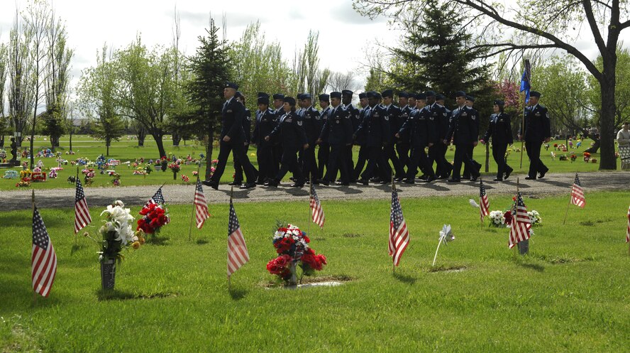 MINOT AIR FORCE BASE, N.D. -- A formation of Airmen from here posts colors during Minot's Memorial Day ceremony May 26 at Rosehill Memorial Cemetery. (U.S Air Force photo by Airman 1st Class Wesley Wright)