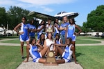 The Randolph High School girls track team pose for a team photo with their championship Class 2A state trophy. From left to right, front row: Jasmine Kent and Jayla McArthur; middle row: Sydney Solomon, Coach Misty Kinsey and Ria Rivers; back row: Tyler Burden, Keisha Abrams, Whitney Trujillo, Kenya Alexander, Tamoya Morrison, Nathalie Goad and Caitlin Carter. (Courtesy photo)