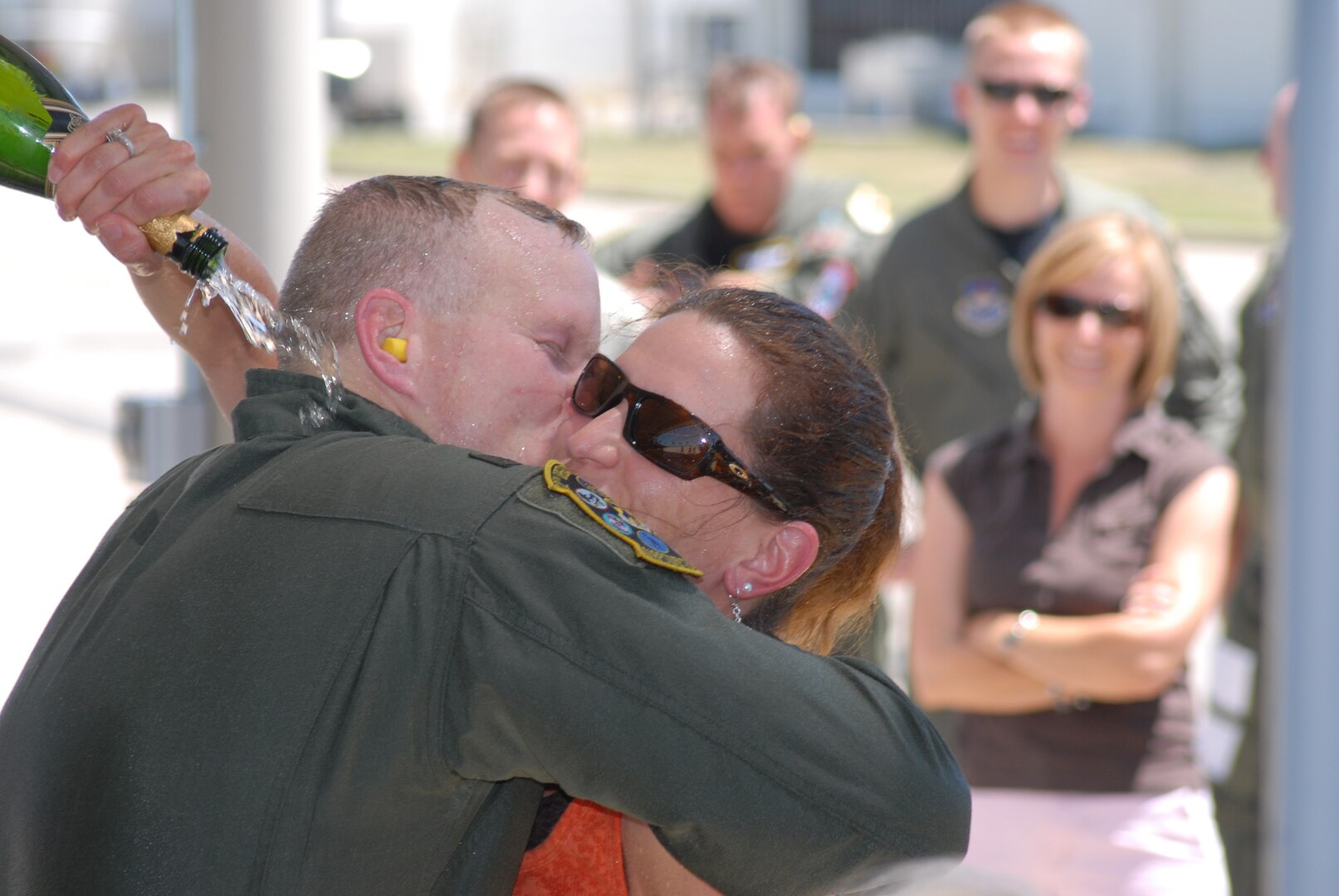 Col. Christopher Weggeman, 12th Operations Group commander, kisses his wife, Ann, following his fini flight in the T-38 Talon here Monday. Colonel Weggeman will be succeeded by Col. Ronald Buckley from the Air War College at Maxwell Air Force Base. (U.S. Air Force photo by Rich McFadden)