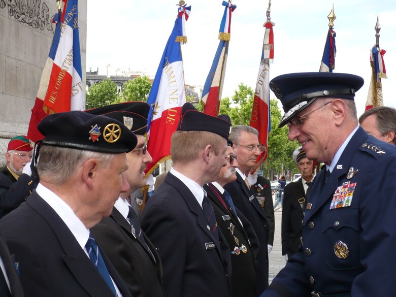 General Roger Brady, Commander, United States Air Forces in Europe, greets veterans at the 2008 Memorial Day ceremony at the Arc de Triomphe in Paris on May 25.  From aircraft flyovers to band performances, USAFE supported more than 20 events in Europe over the Memorial Day weekend.  (Photo by Susan Strednansky)