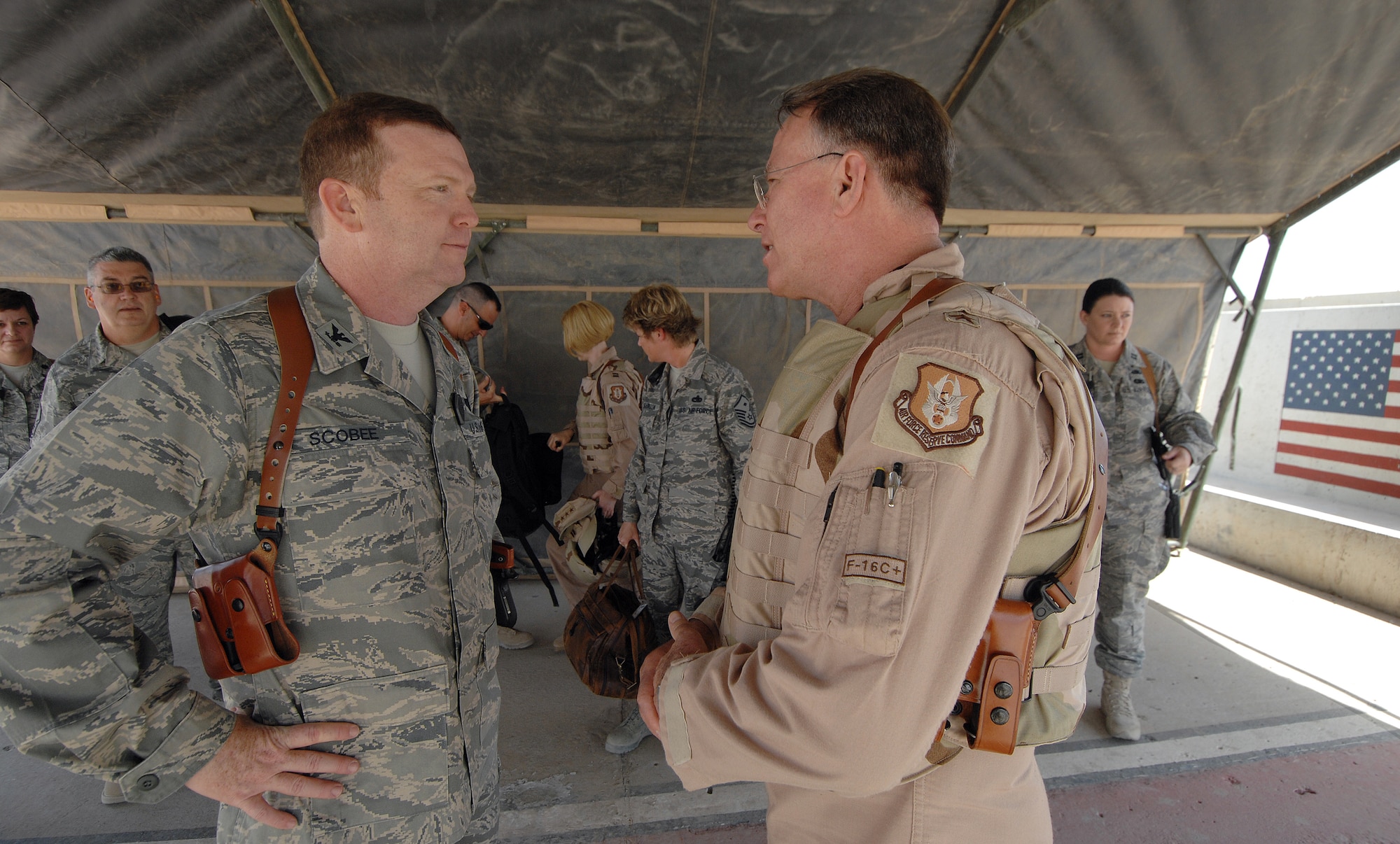 Lt. Gen. John Bradley, commander of the Air Force Reserve Command (right), is greeted by Col. Richard Scobee, 506th Air Expeditionary Group commander, during his visit May 25 here. General Bradley is visiting Airmen throughout the deployed environment to thank them for their service supporting the Global War on Terrorism. (U.S. Air Force photo by Master Sgt. Rick Sforza)