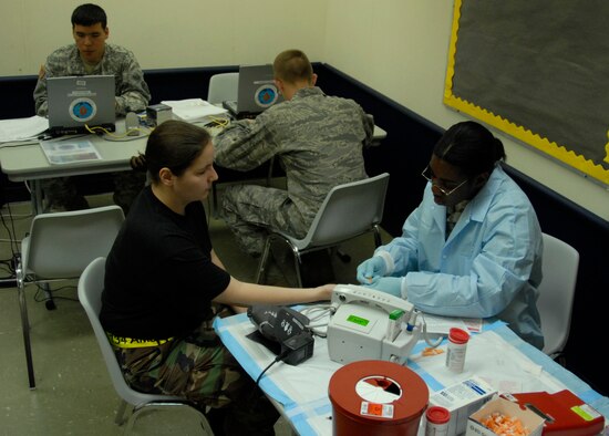 Members of the United States Navel Hospital Okinawa check vital signs and iron levels from donators at this year’s annual Blood Drive located on Andersen Air Force Base, Guam on May 20, 2008.  The members of the Navel Hospital are part of the Armed Service Blood Bank Center that represents the blood supply of the whole area of readiness within the Western Pacific realm. ( US Air Force photo by Airman First Class Courtney Witt)