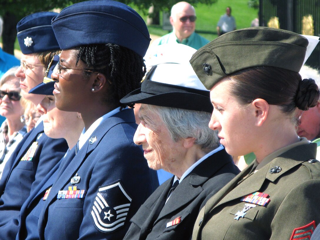 From left to right: Air Force Reserve Chaplain (Lt. Col.) Karis K. Graham, Coast Guard Lt. Aja Kirksey, Air National Guard Master Sgt. Karen Marshall, retired Navy Master Chief Petty Officer Anna Der-Vartanian, and Marine Sgt. Danielle Holladay listen during the Women in Military Service for America Memorial’s annual Memorial Day observance, Arlington National Cemetery, Arlington, Va., May 26, 2008. 