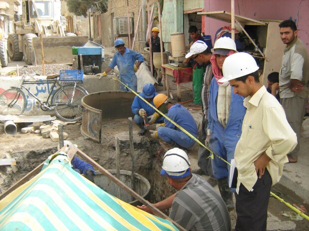 (June 11, 2008) â?? Iraqi contractors rebuild a guard house in the city of Fallujah, June 11.  Civil Affairs Teams augmented with 3rd Battalion, 6th Marine Regiment, Regimental Combat Team-1are continuously working with Fallujah City Council members, local tribal leaders and local nationals to carry out projects in an effort to improve the cityâ??s infrastructure. (Official U.S. Marine Corps photo by Sgt. Joseph Gaines) (RELEASED)