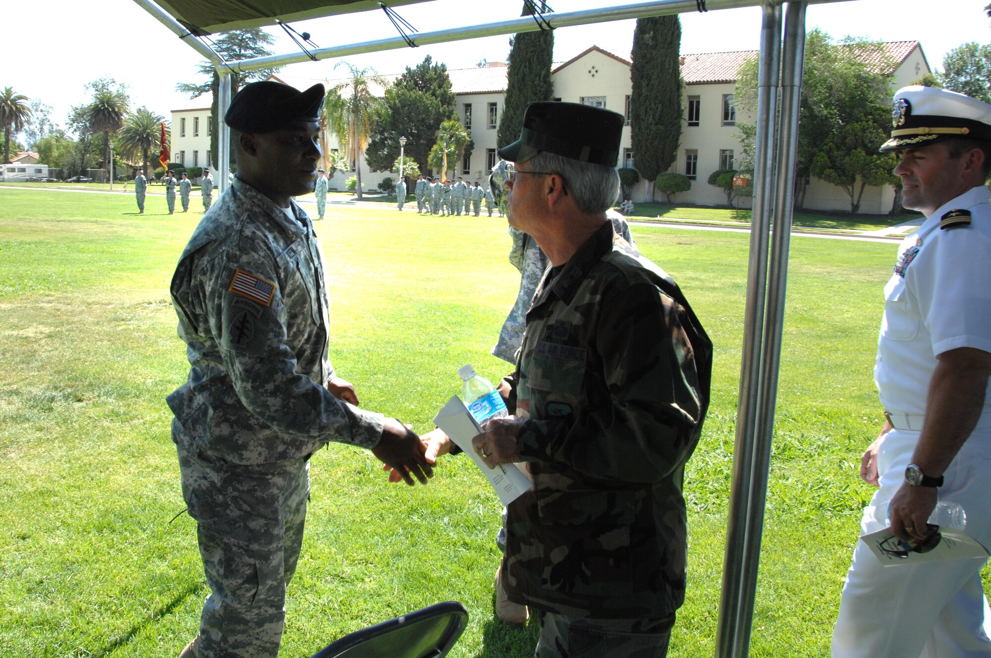 Lt. Col. Norman B. Green, in-coming 304th SB commander, meets Col. Bruce Stewart, 163rd Reconnaissance Wing vice commander. (U.S. Air Force photos by TSgt. Julie Avey, 163 RW)
